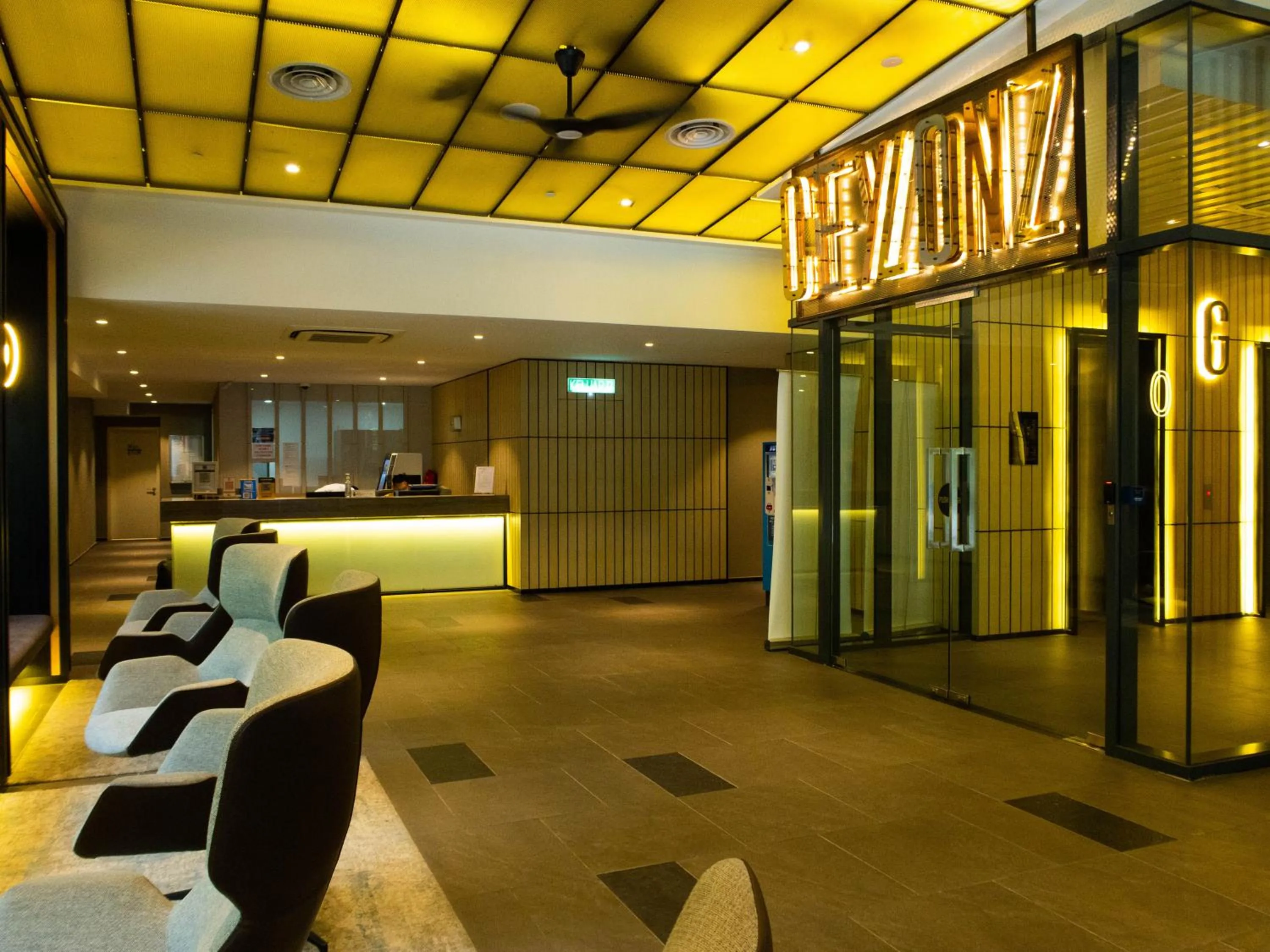 Seating area in Ceylonz Suites KLCC Rooftop Infinity Pool KL Tower View