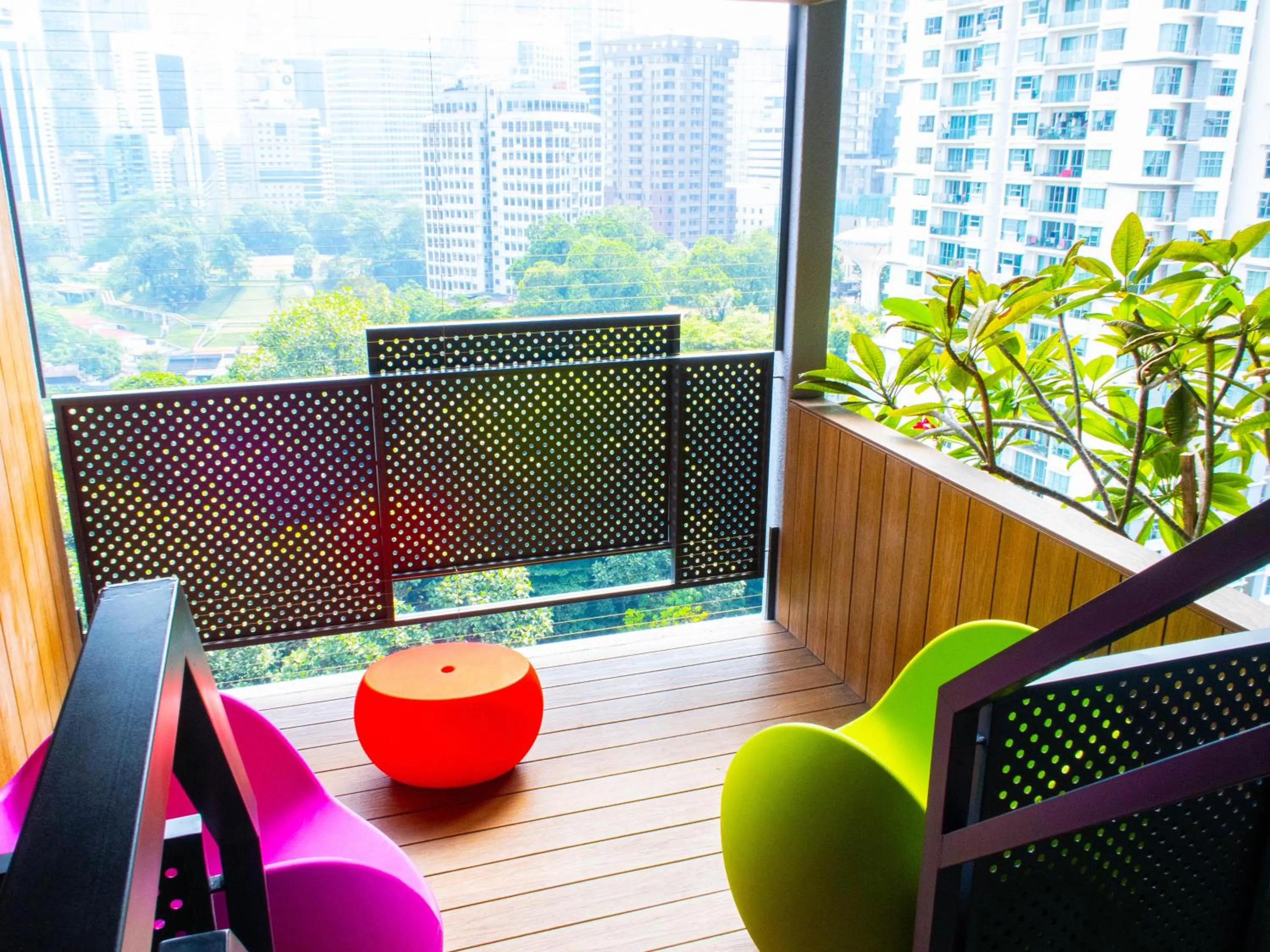 Seating area in Ceylonz Suites KLCC Rooftop Infinity Pool KL Tower View