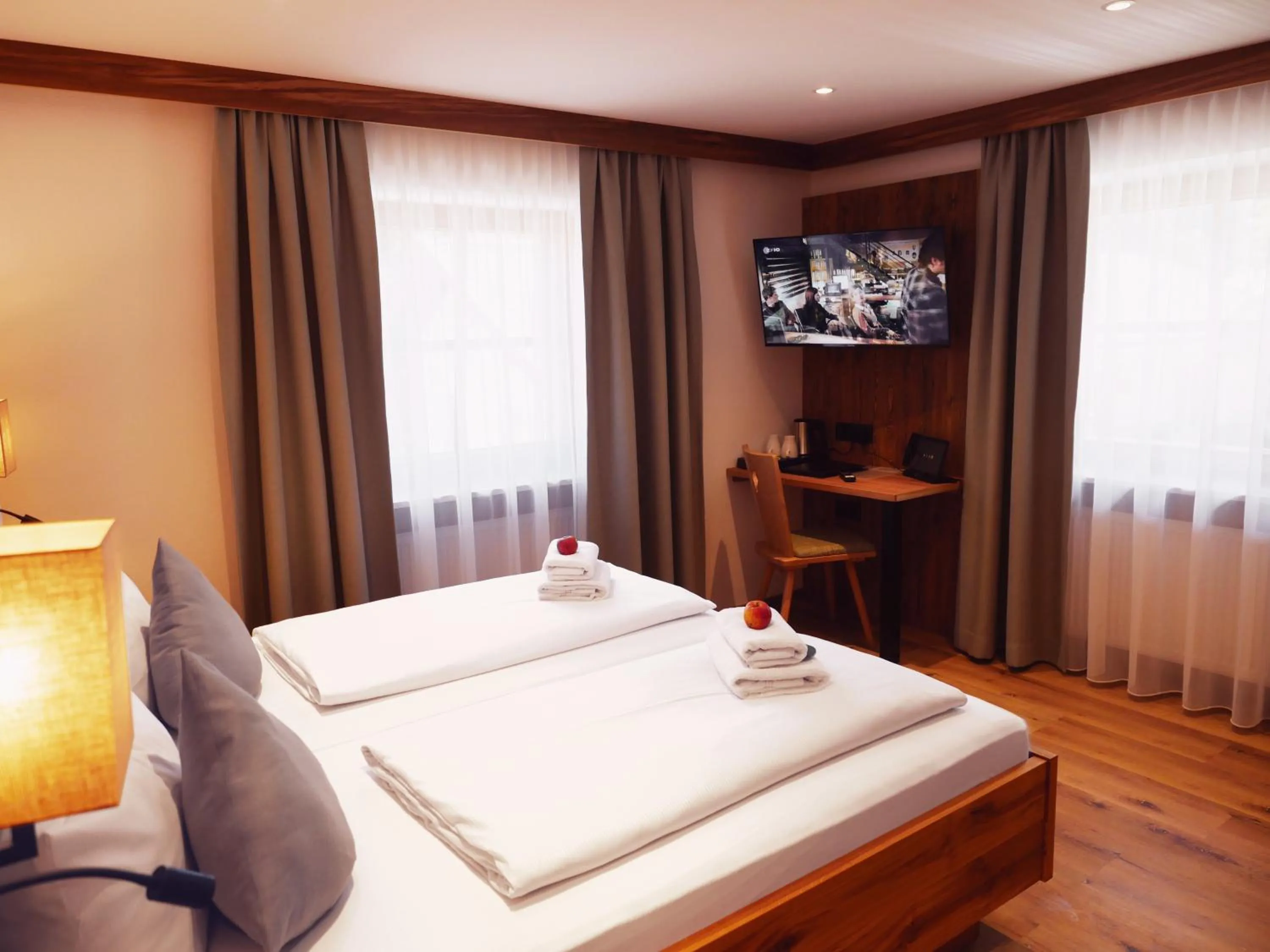 Bed in DEVA Hotel Alpenglück