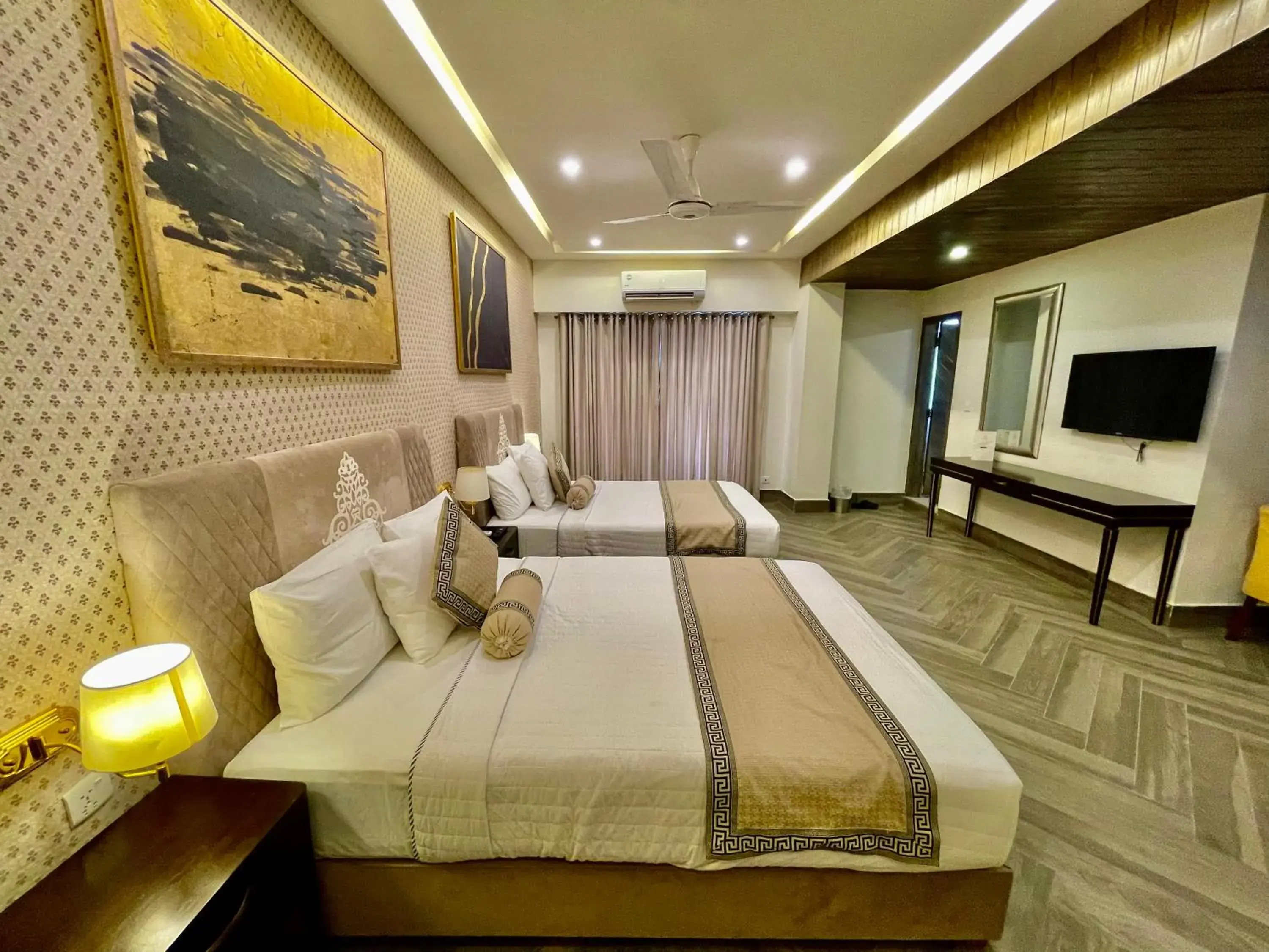 Family Room with Balcony in Shelton's Ambassador Family Room with Balcony in Shelton's Ambassador