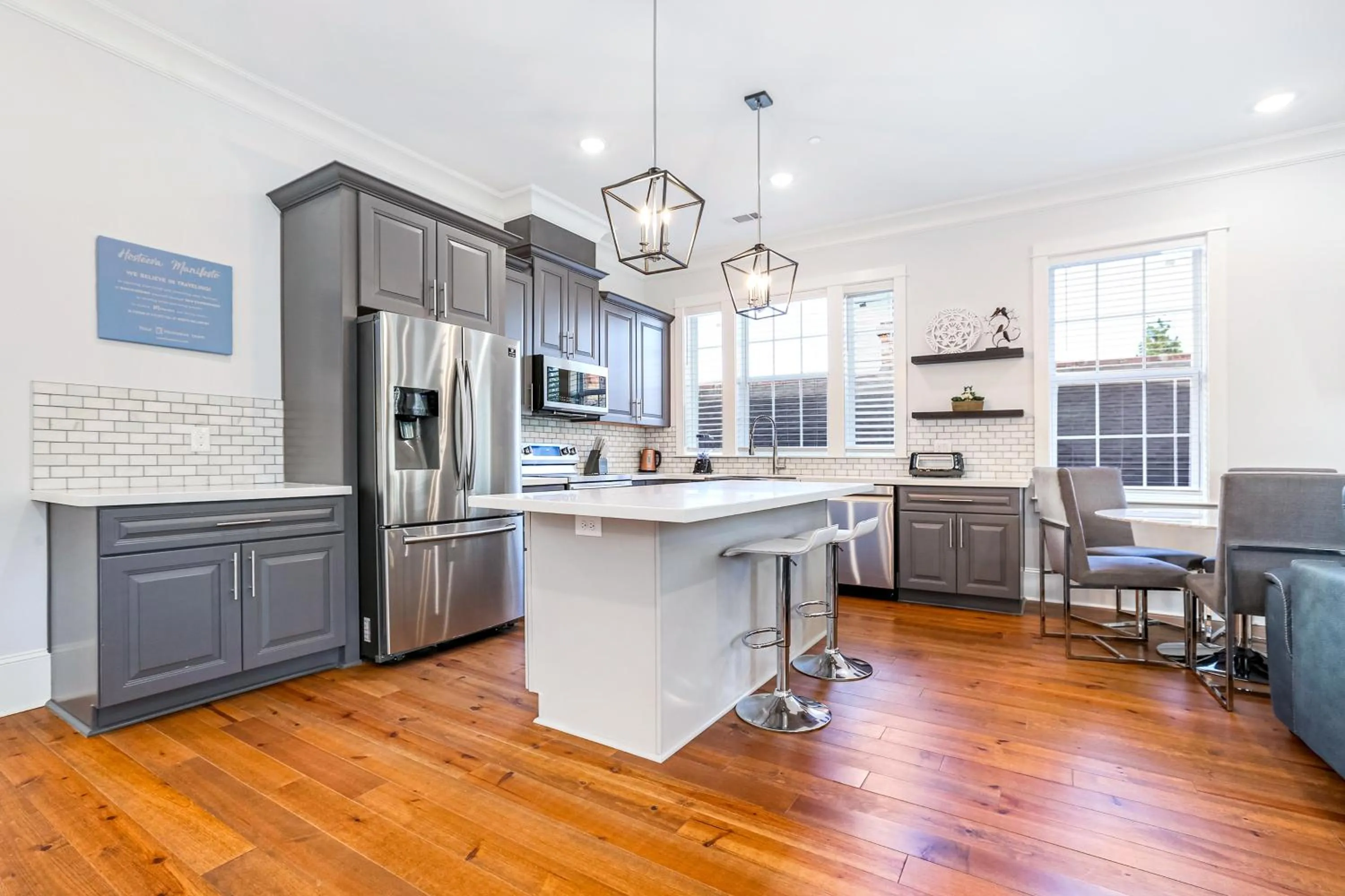 Kitchen or kitchenette in Hosteeva Chic Urban Retreat w Pool Steps to St Charles Ave and Near Bourbon St