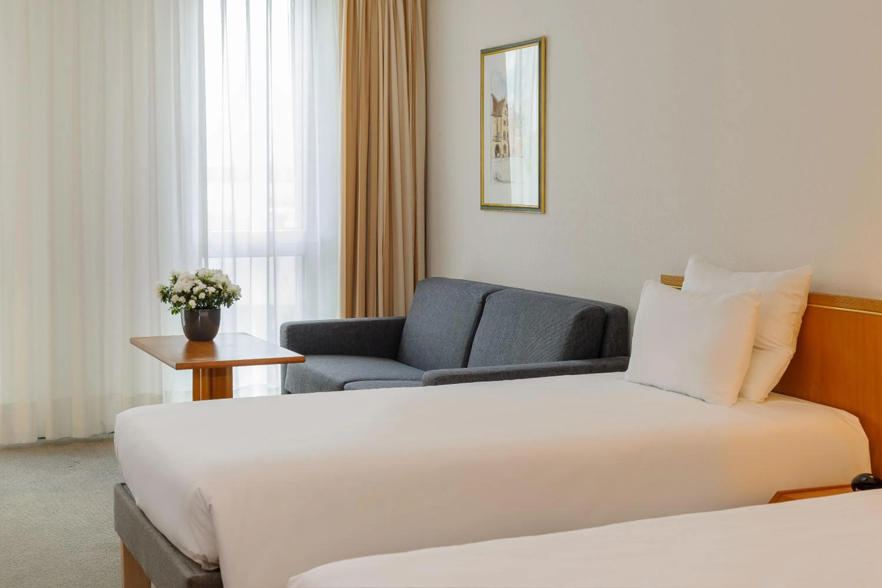 Bed in Novotel Freiburg am Konzerthaus