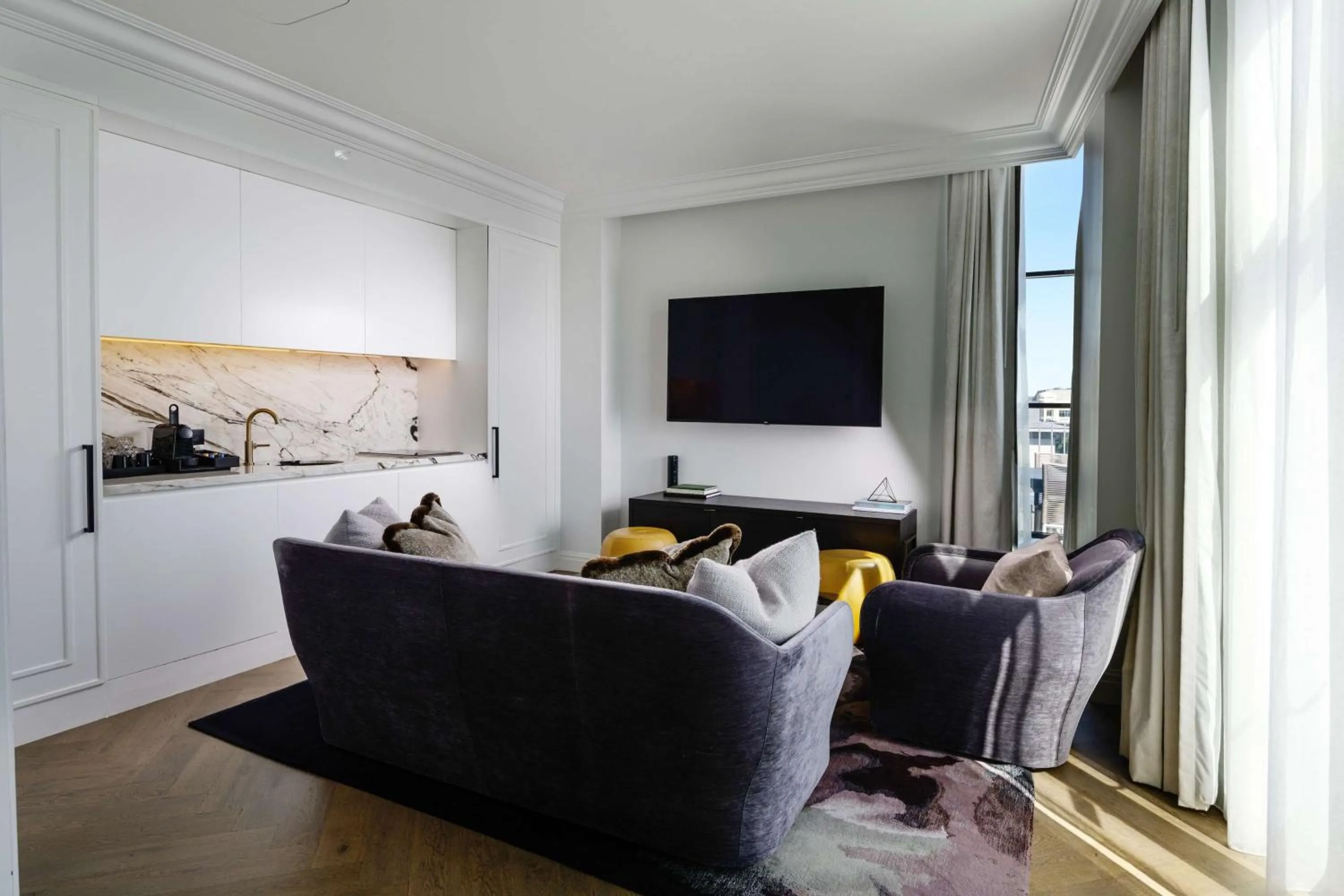 Living room in Daxton Hotel Birmingham, Curio Collection by Hilton