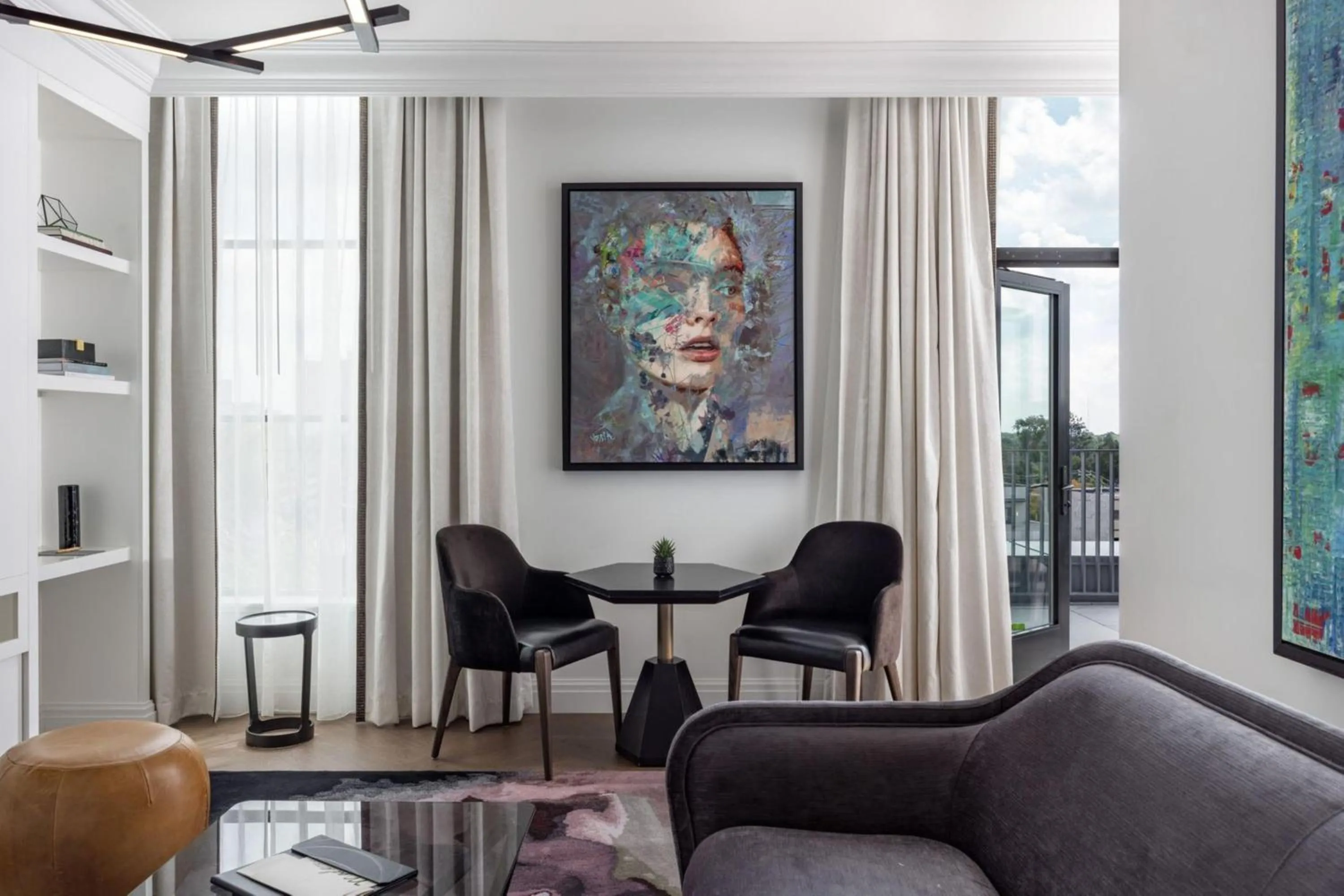 Living room in Daxton Hotel Birmingham, Curio Collection by Hilton