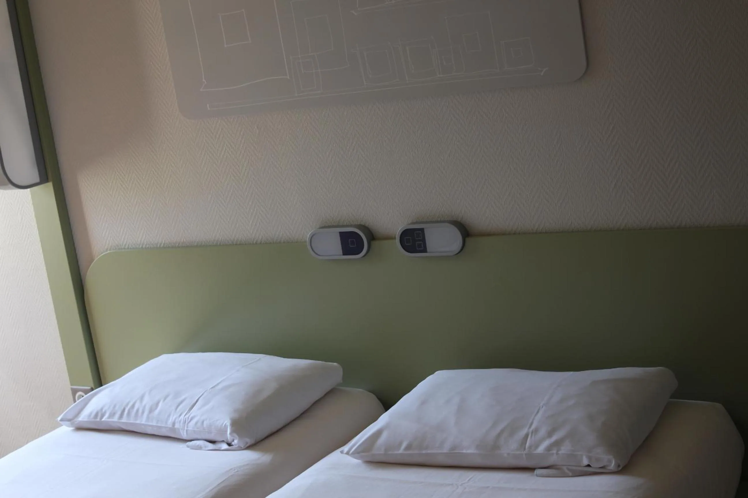 Bed in Hotel ibis Budget Laval