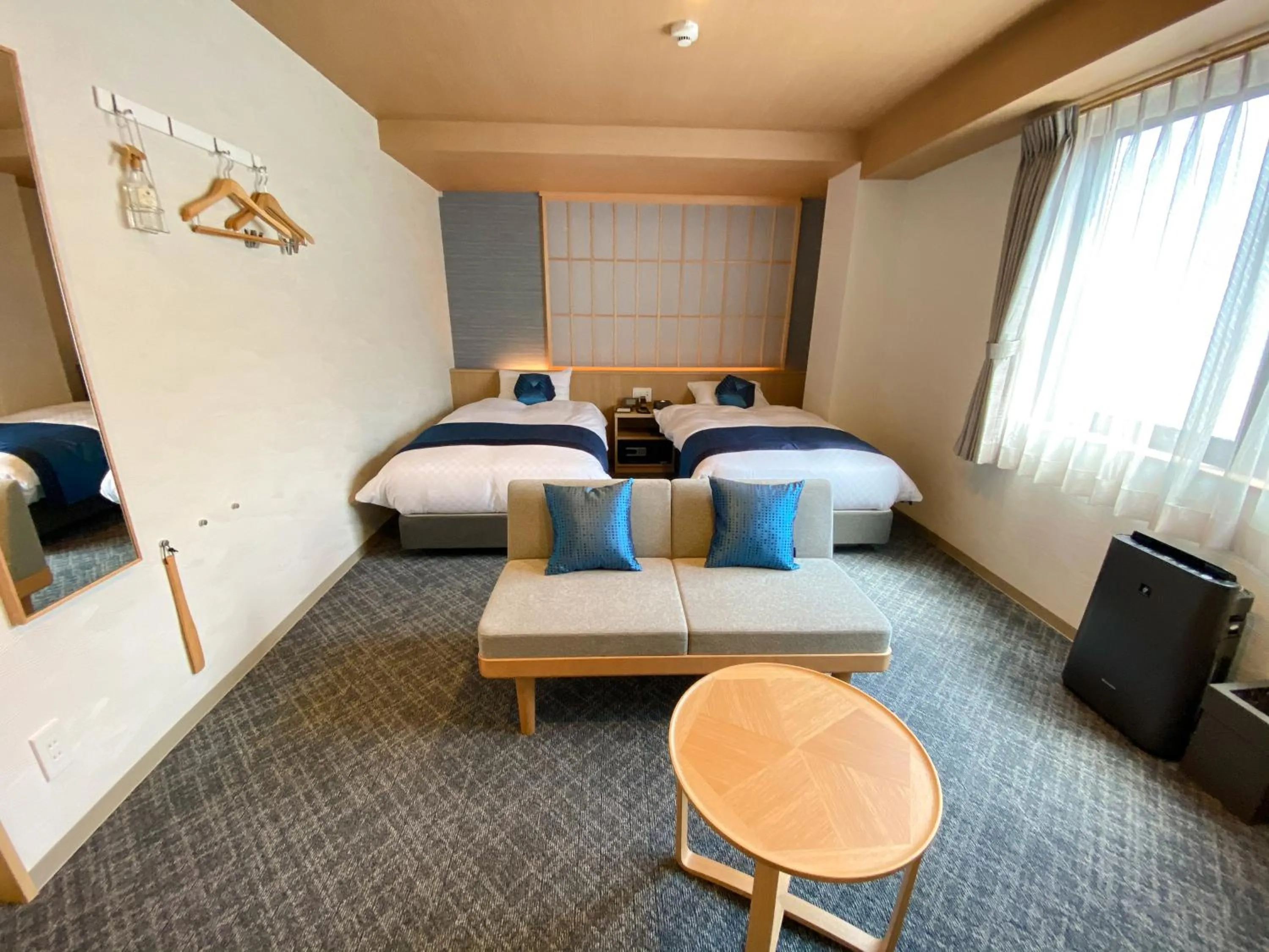 Photo of the whole room, Bed in Rinn Niomon