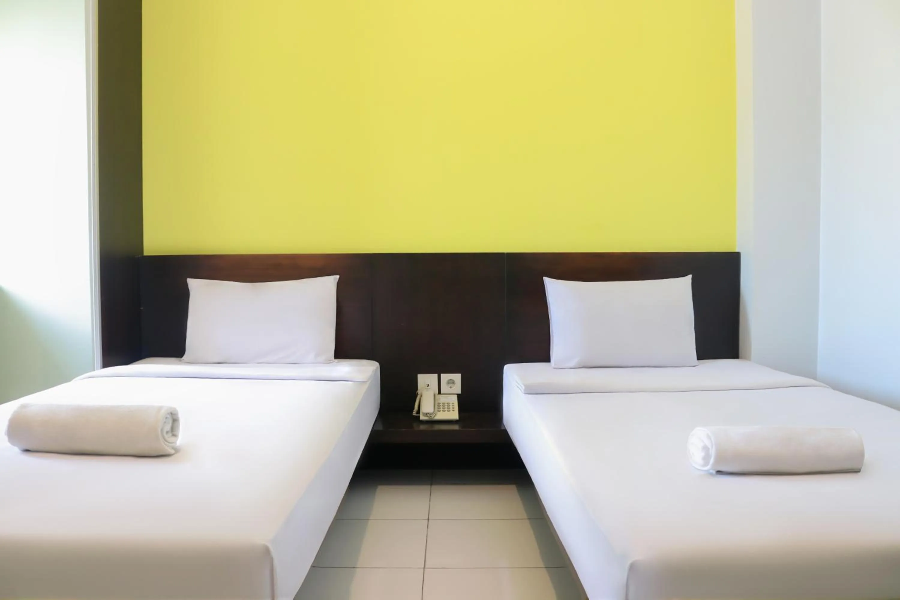 Bedroom, Bed in LeGreen Suite Ratulangi