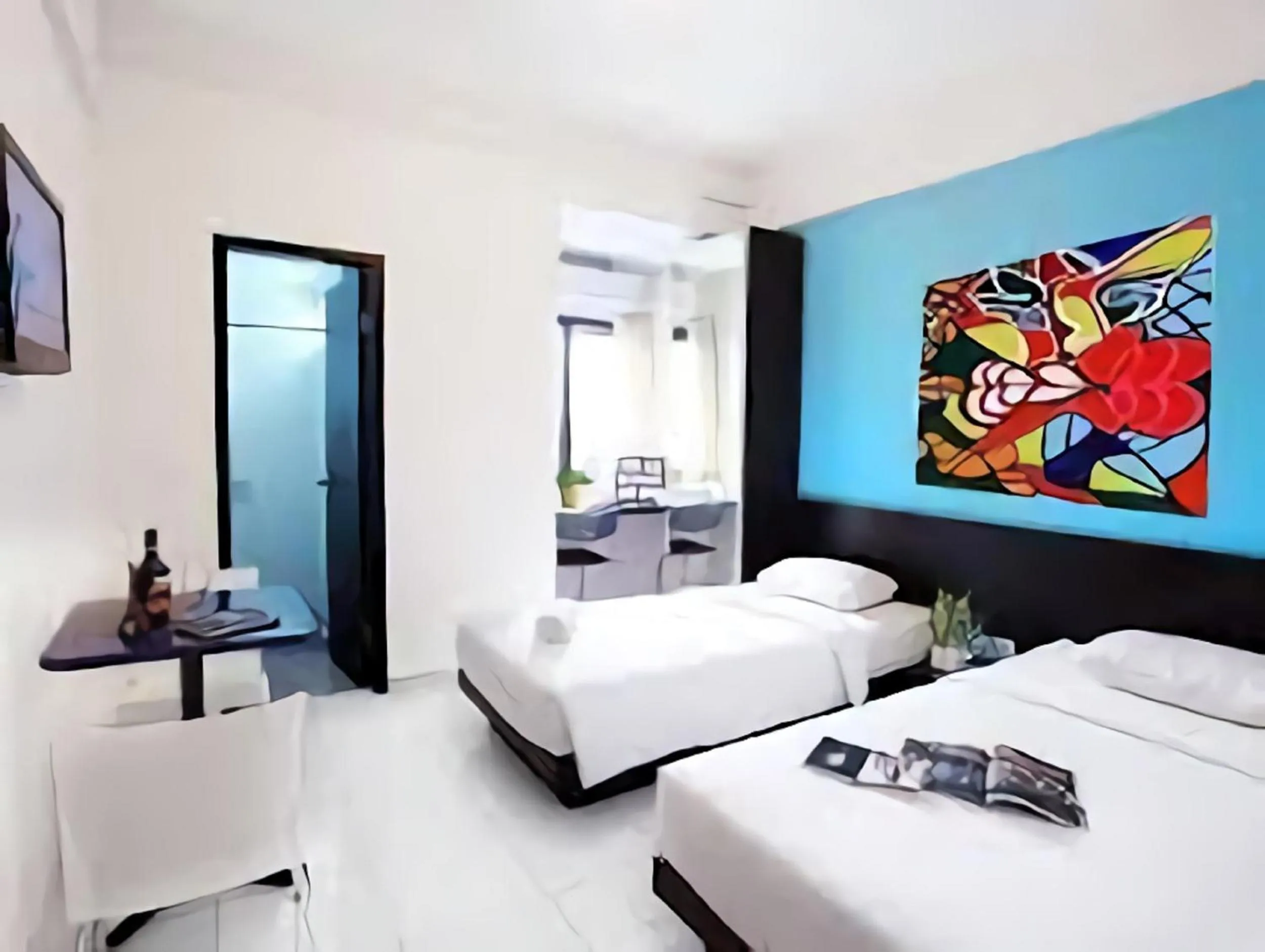 Bedroom, Bed in LeGreen Suite Ratulangi
