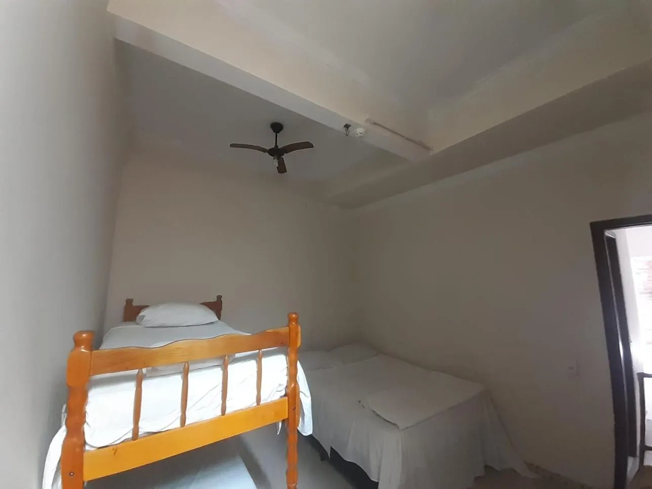 Bed in Pousada Maré Boa