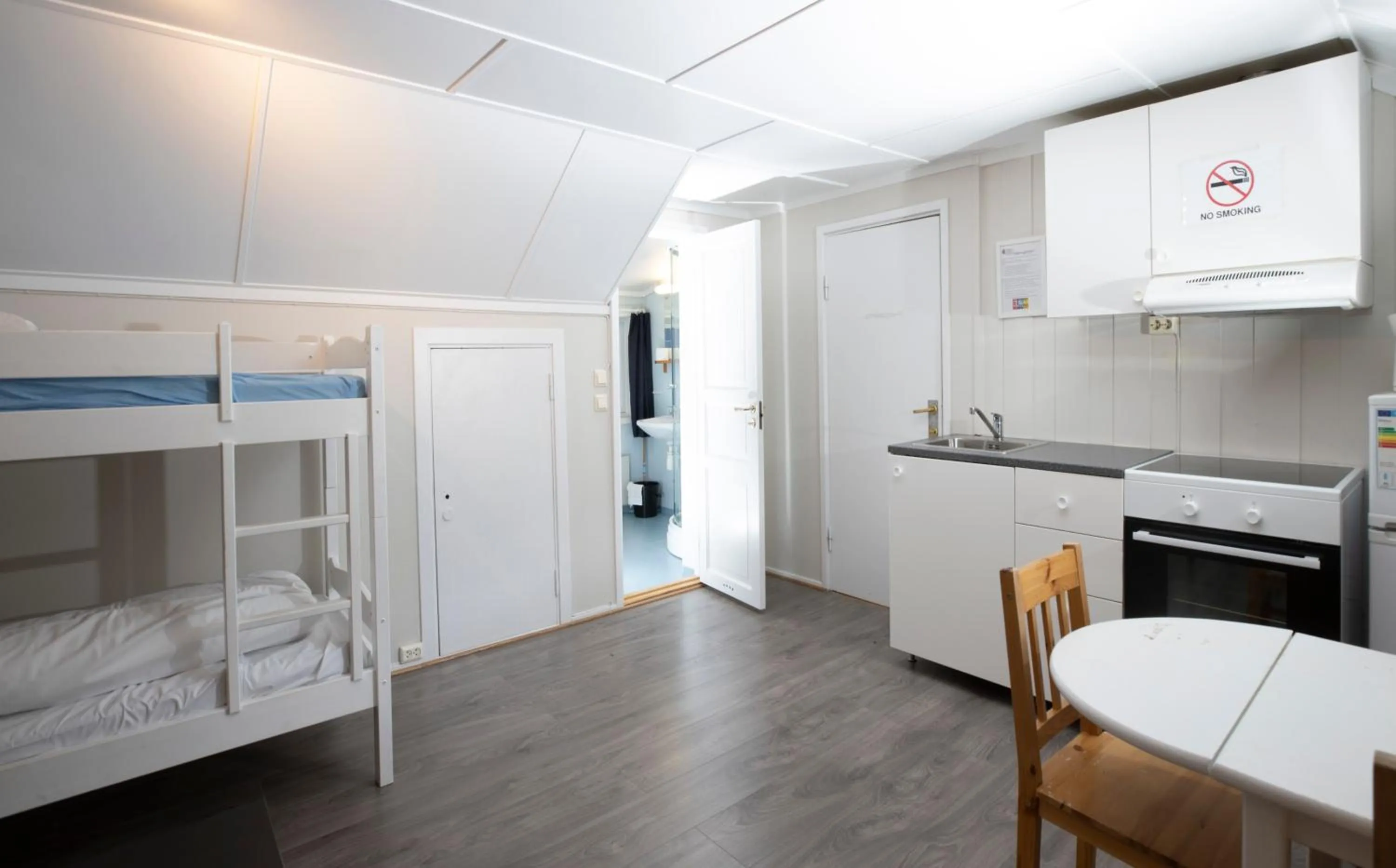 Kitchen or kitchenette, Bed in Lillehammer Camping
