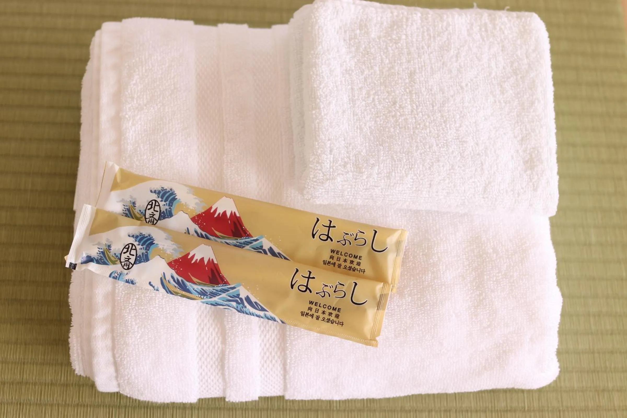 towels in Guesthouse All you need - All rooms have an ocean view!