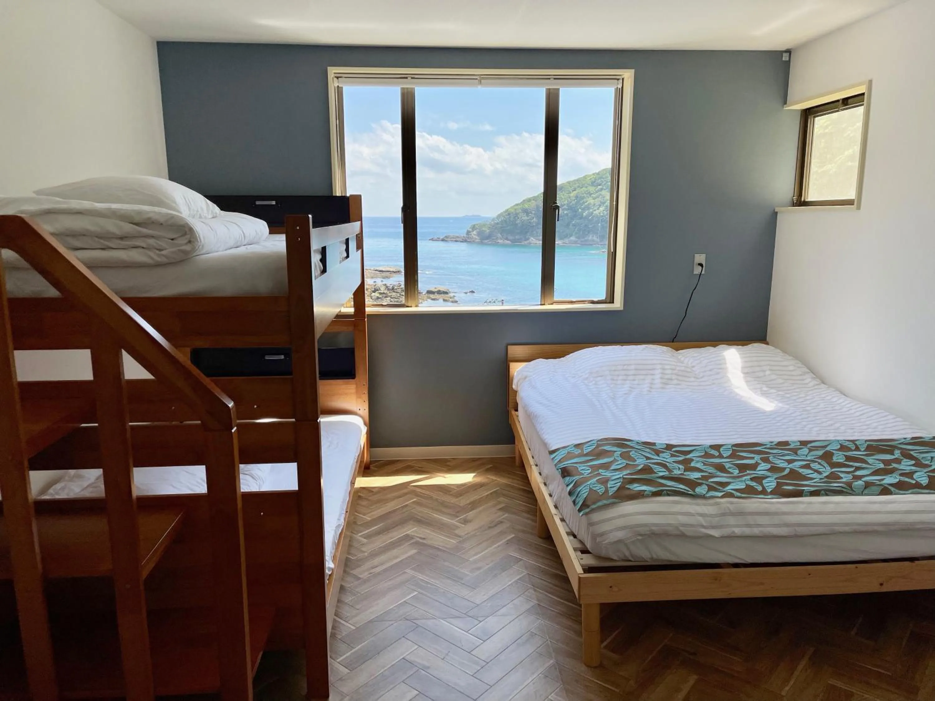 Bedroom, Bed in Guesthouse All you need - All rooms have an ocean view!