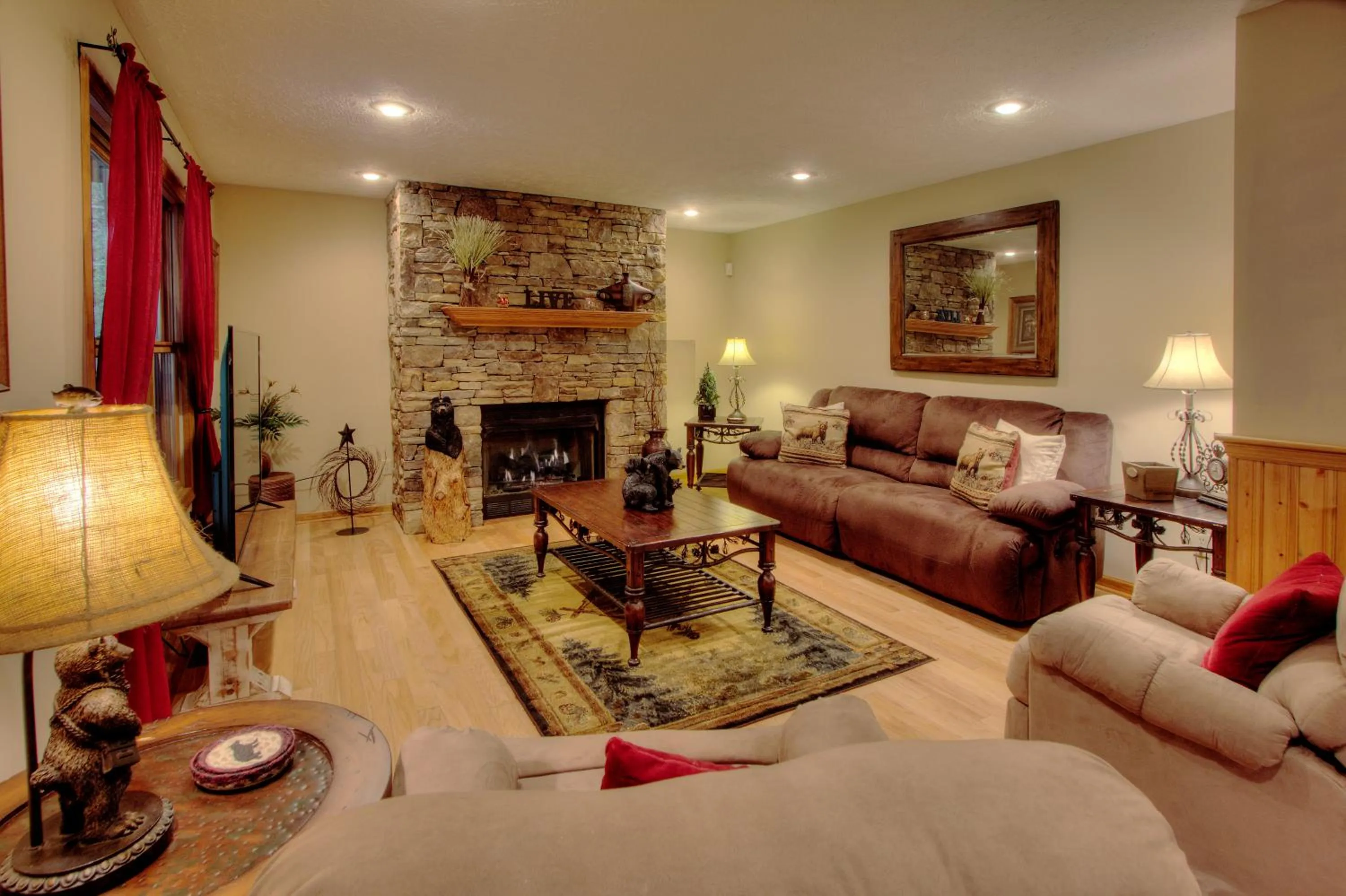 Living room in Gorgeous "Country Roads" by HoneyBearCabins 4BR 4BA, next to pool, easy drive, main strip location!