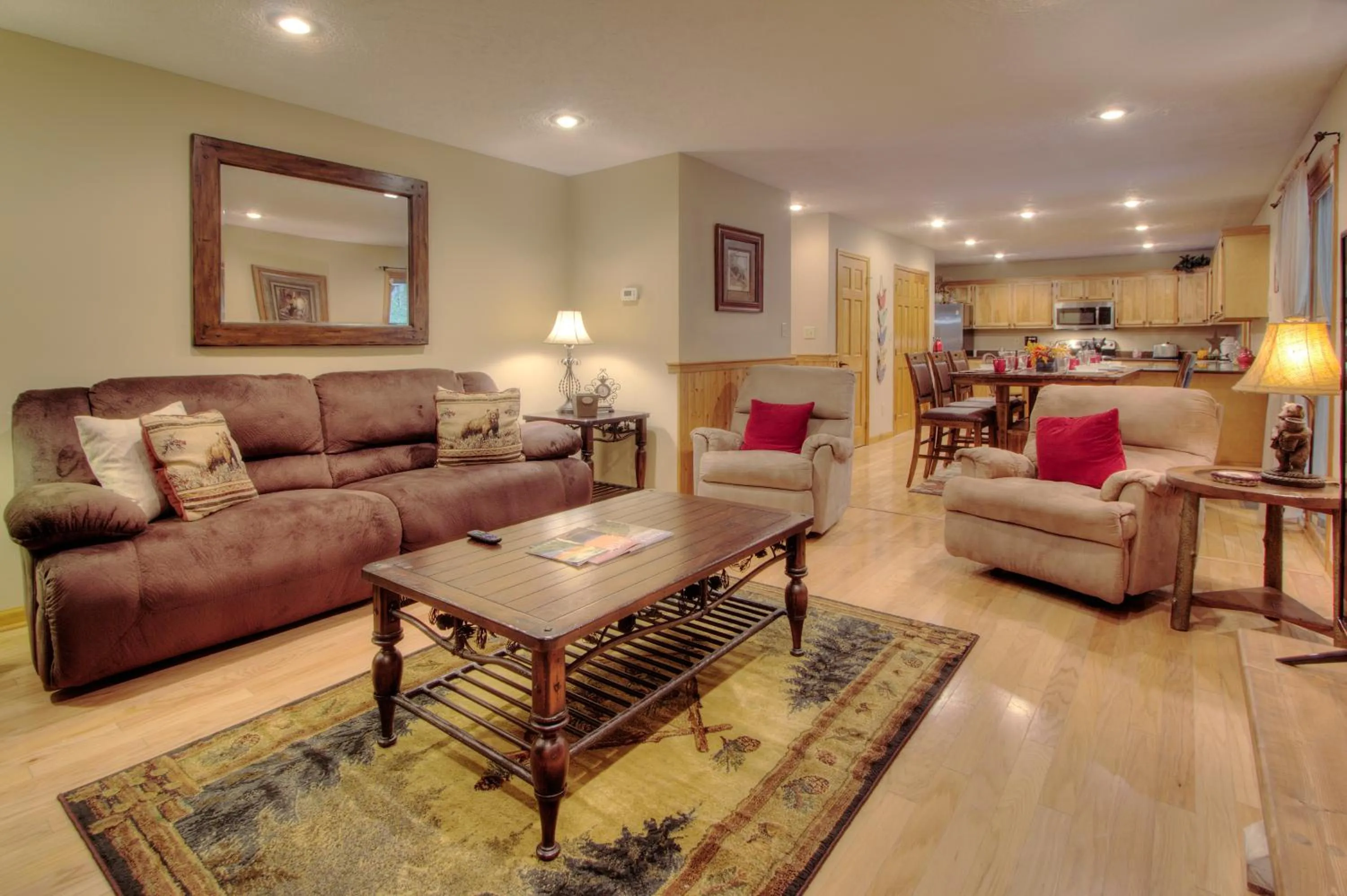 Living room in Gorgeous "Country Roads" by HoneyBearCabins 4BR 4BA, next to pool, easy drive, main strip location!