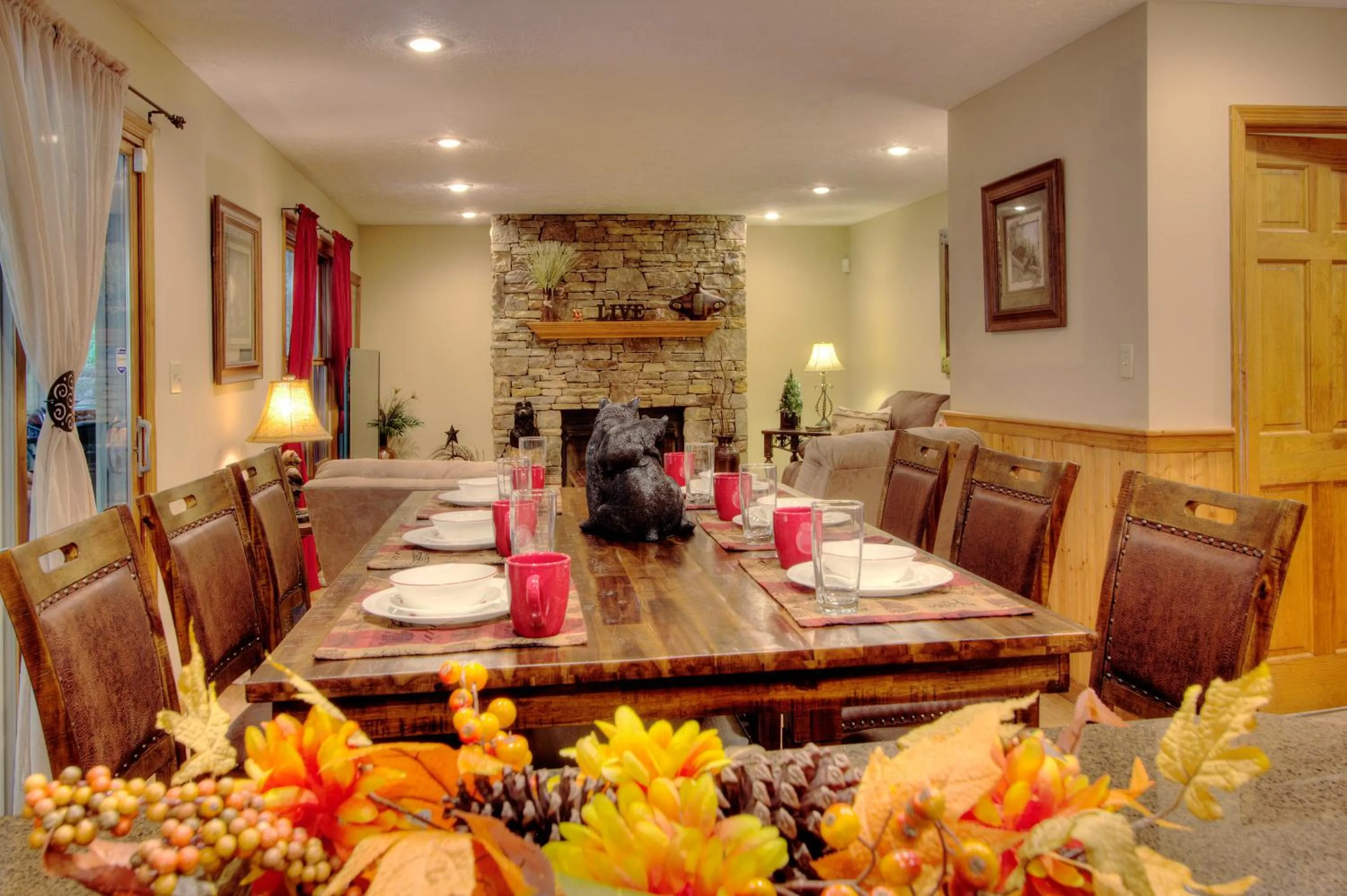 Dining area in Gorgeous "Country Roads" by HoneyBearCabins 4BR 4BA, next to pool, easy drive, main strip location!
