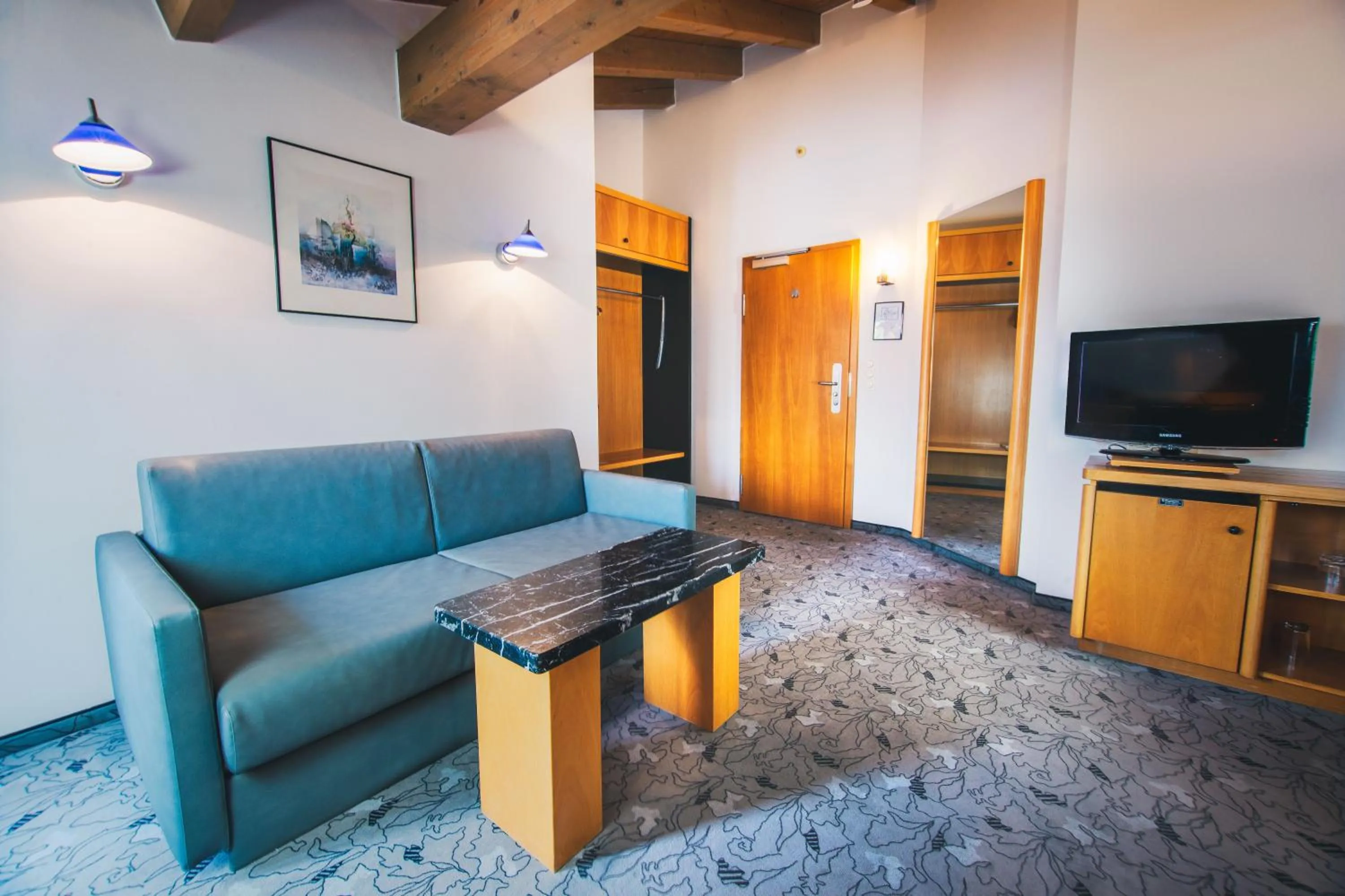 Seating area in Villa Waldperlach by Blattl