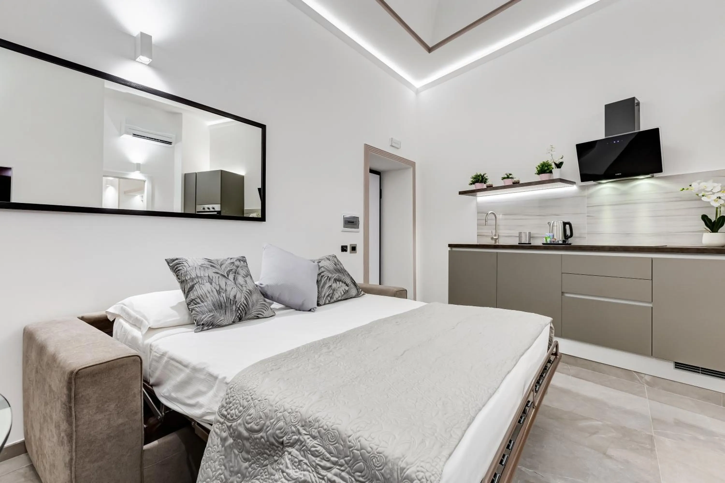 Bed in UnoSeiTre - Luxury Apartment & Suite