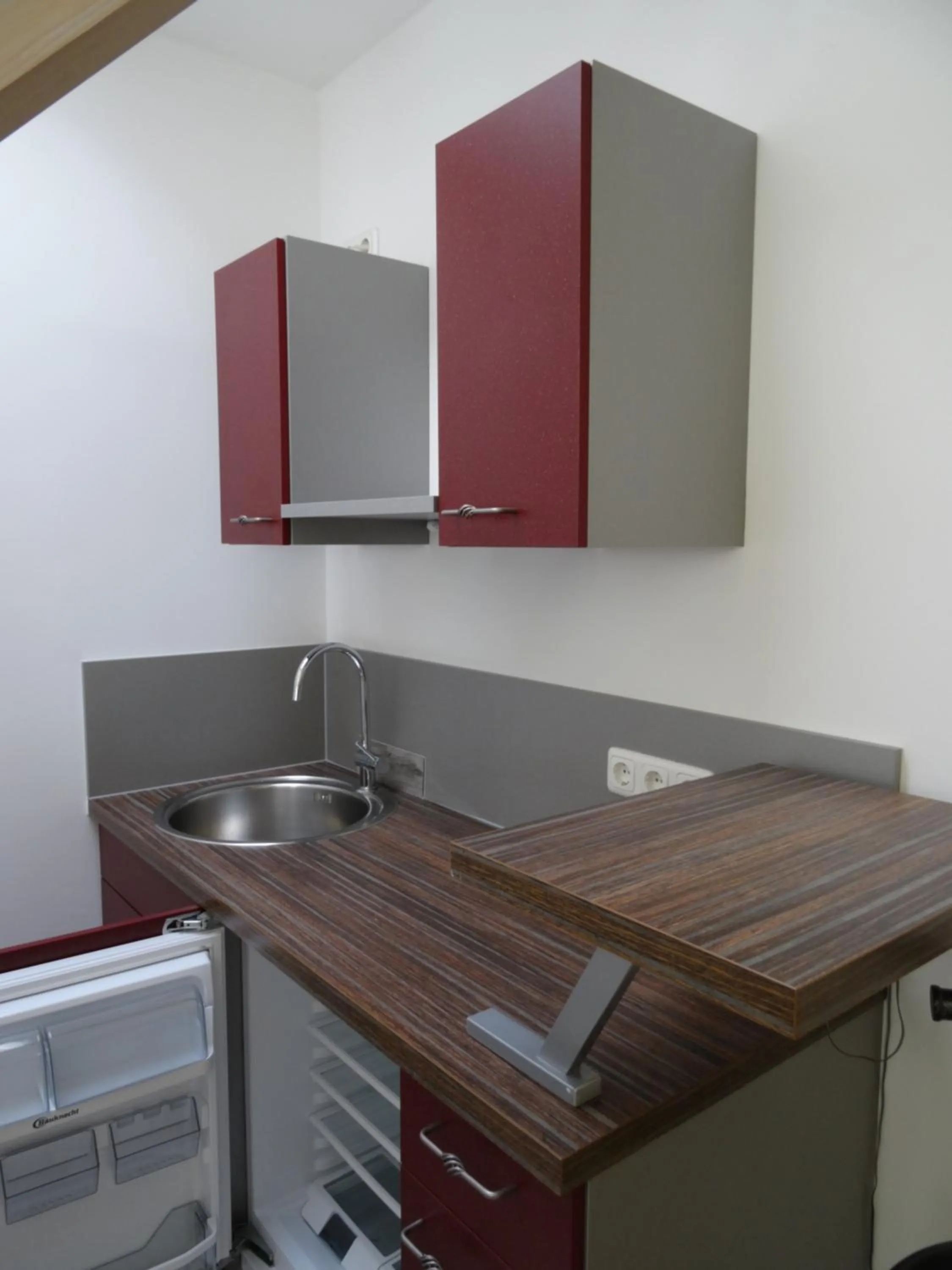 Kitchen or kitchenette in Airport Park Hotel MUC