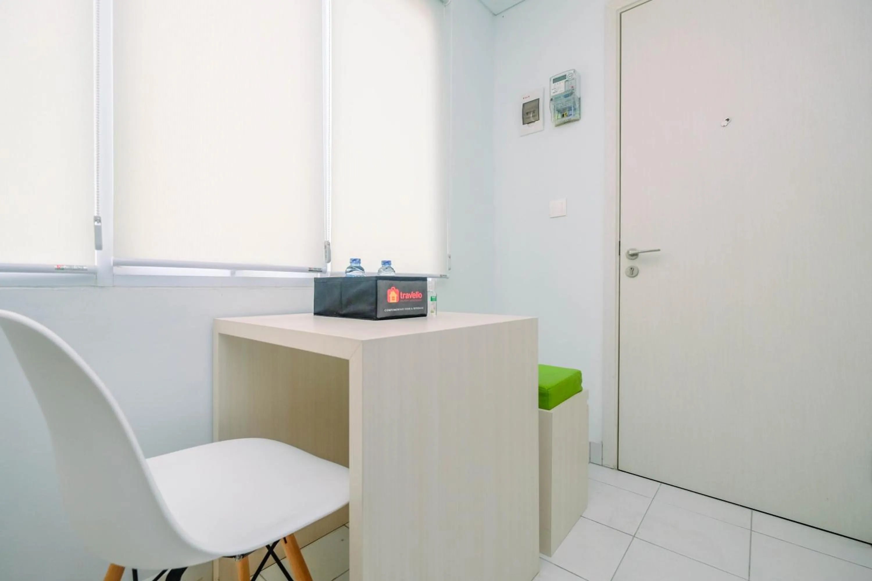 Comfy and Minimalist 1BR Patraland Urbano Apartment near Bekasi Station By Travelio