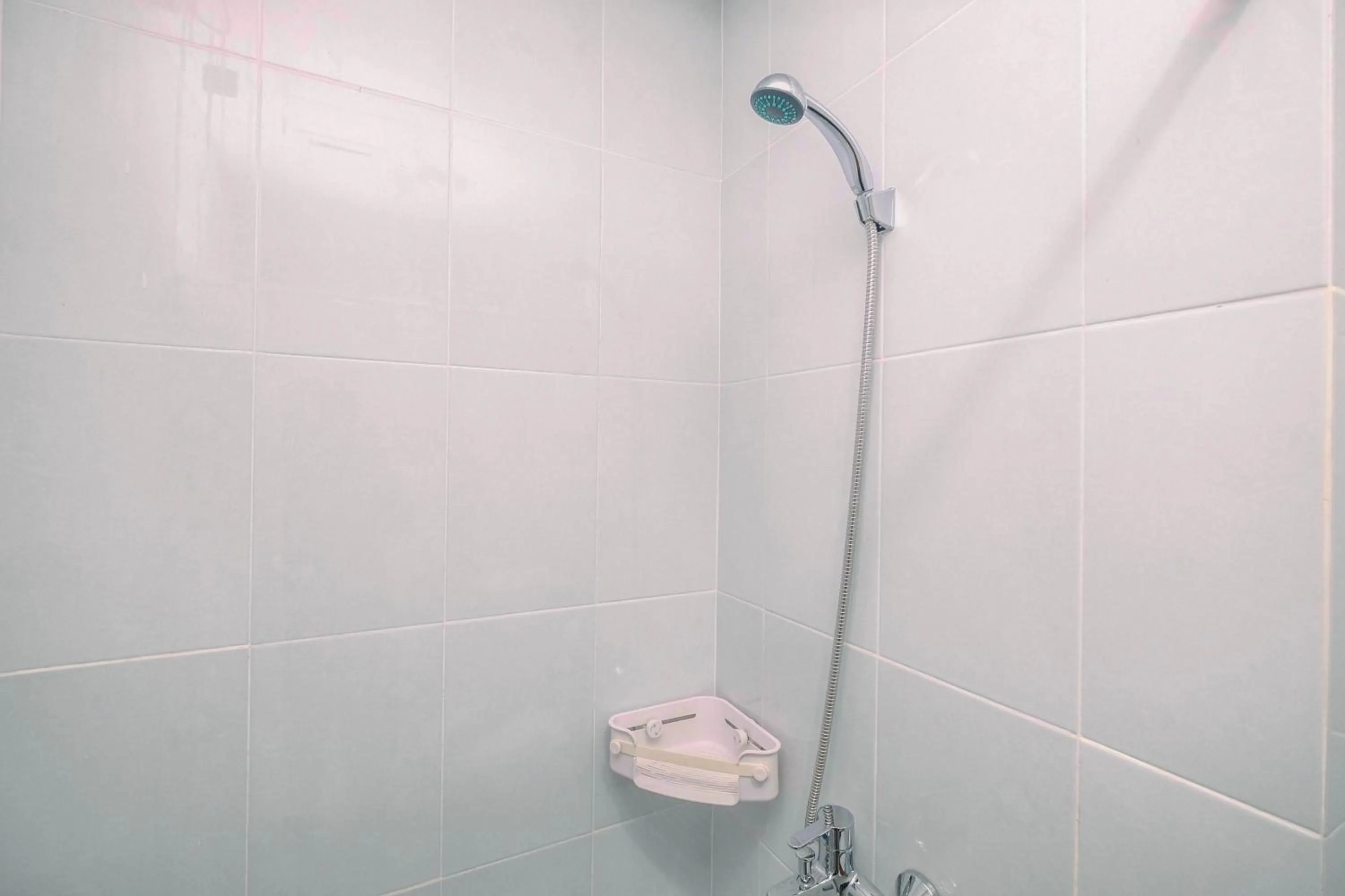 Comfy and Minimalist 1BR Patraland Urbano Apartment near Bekasi Station By Travelio