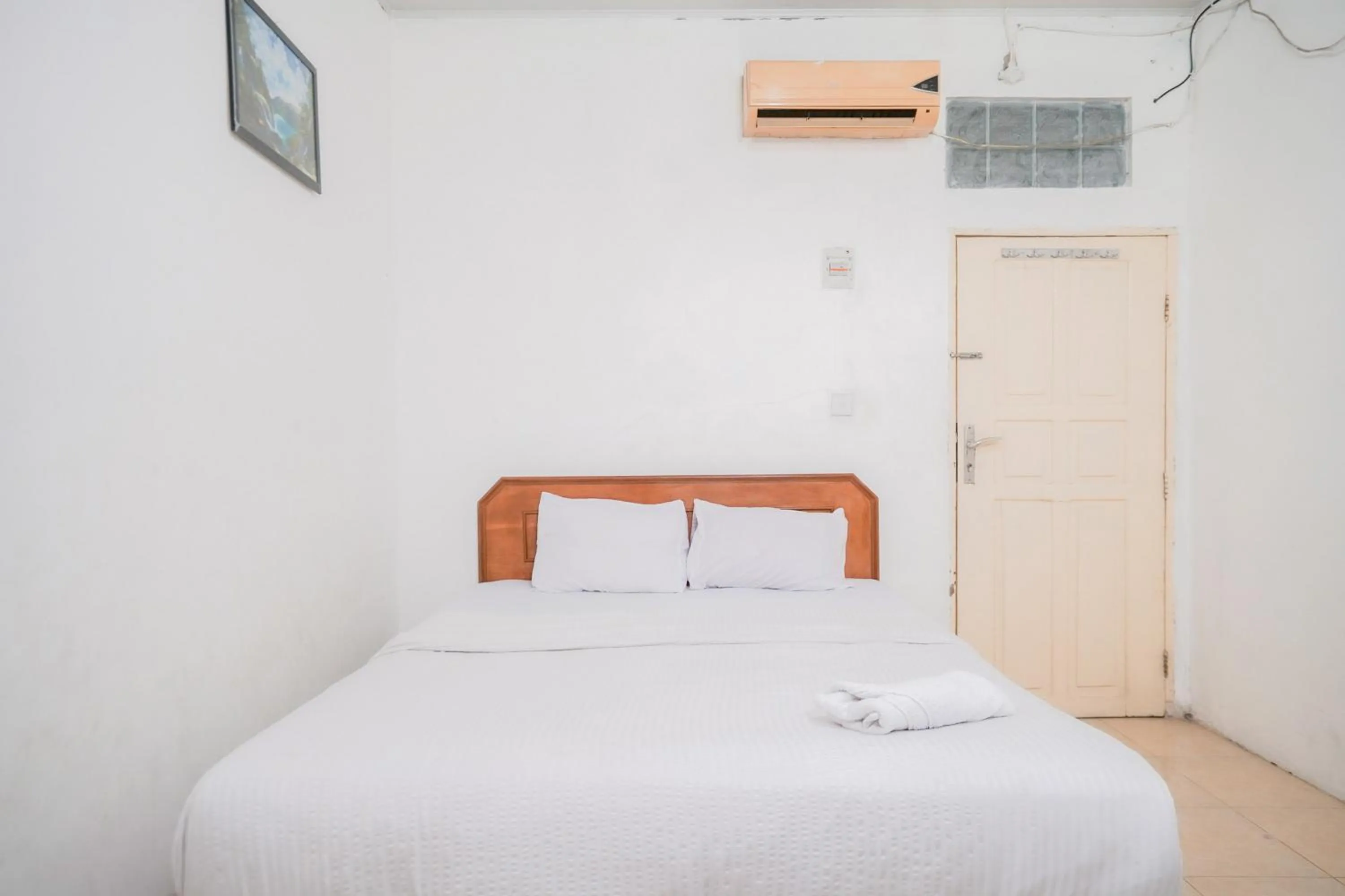 Bedroom, Bed in Urbanview Hotel Mine Residence Syariah