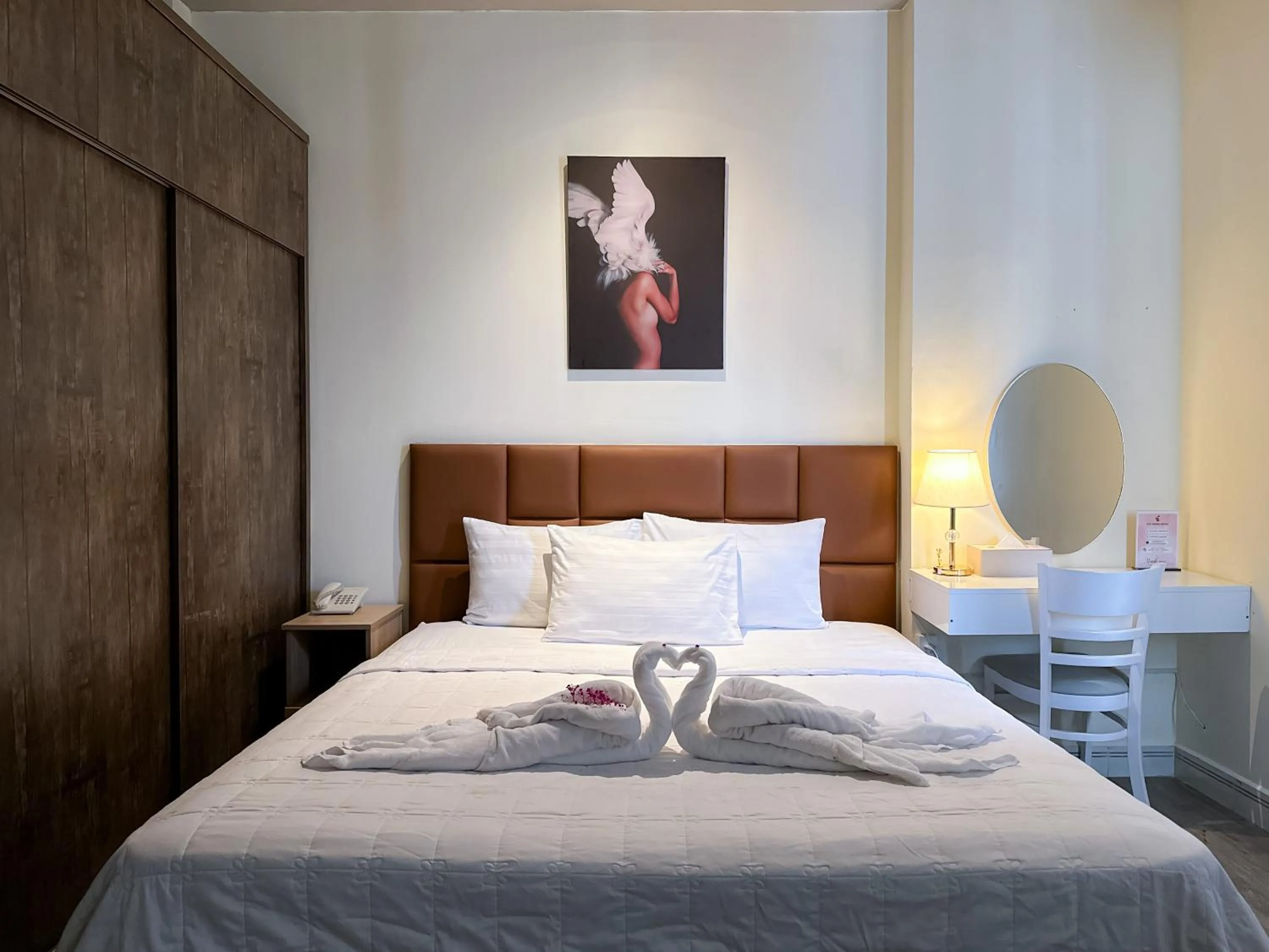 Bed in Eva Adam Hotel