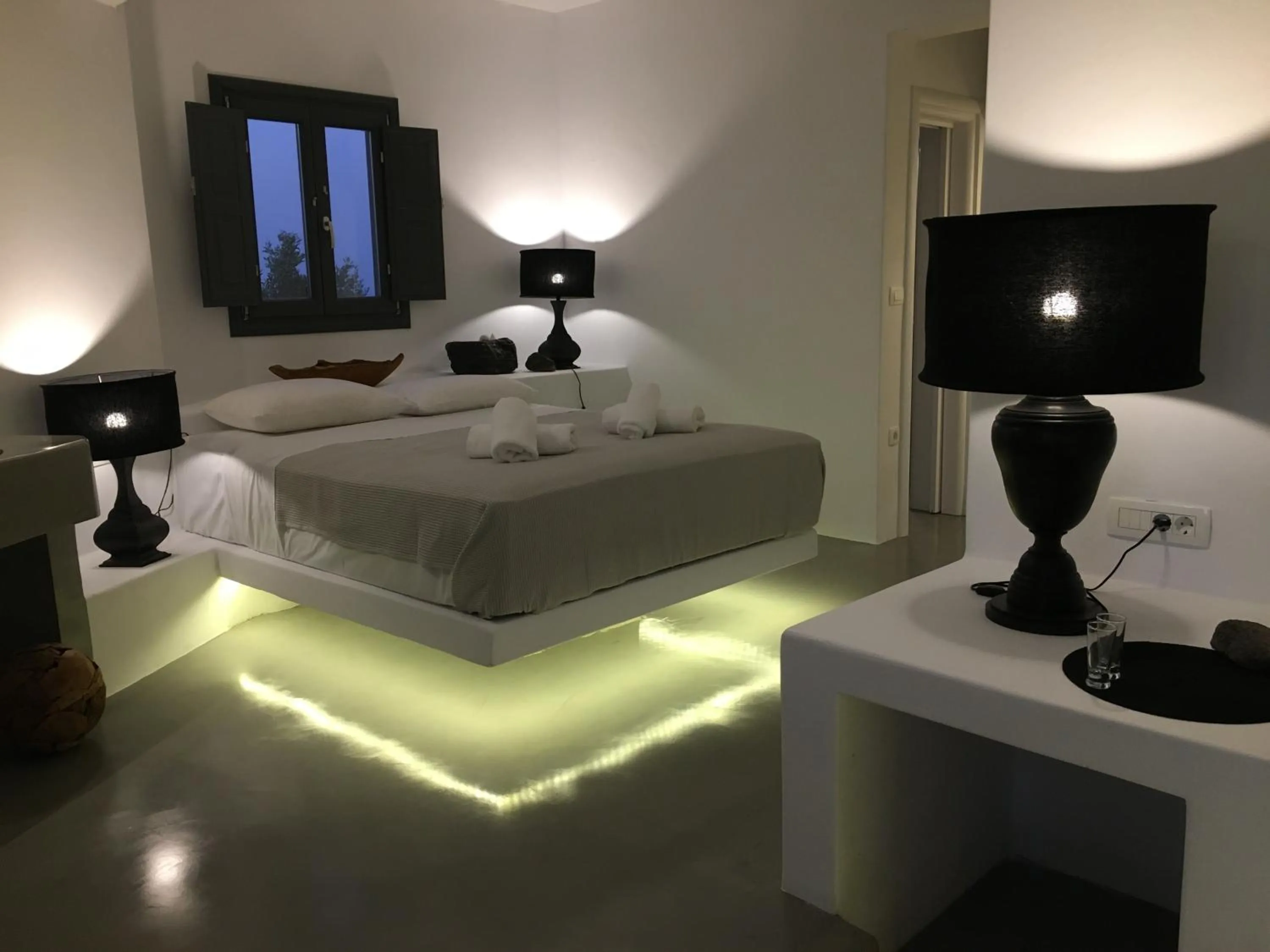 Bed in Santolia Art Suites