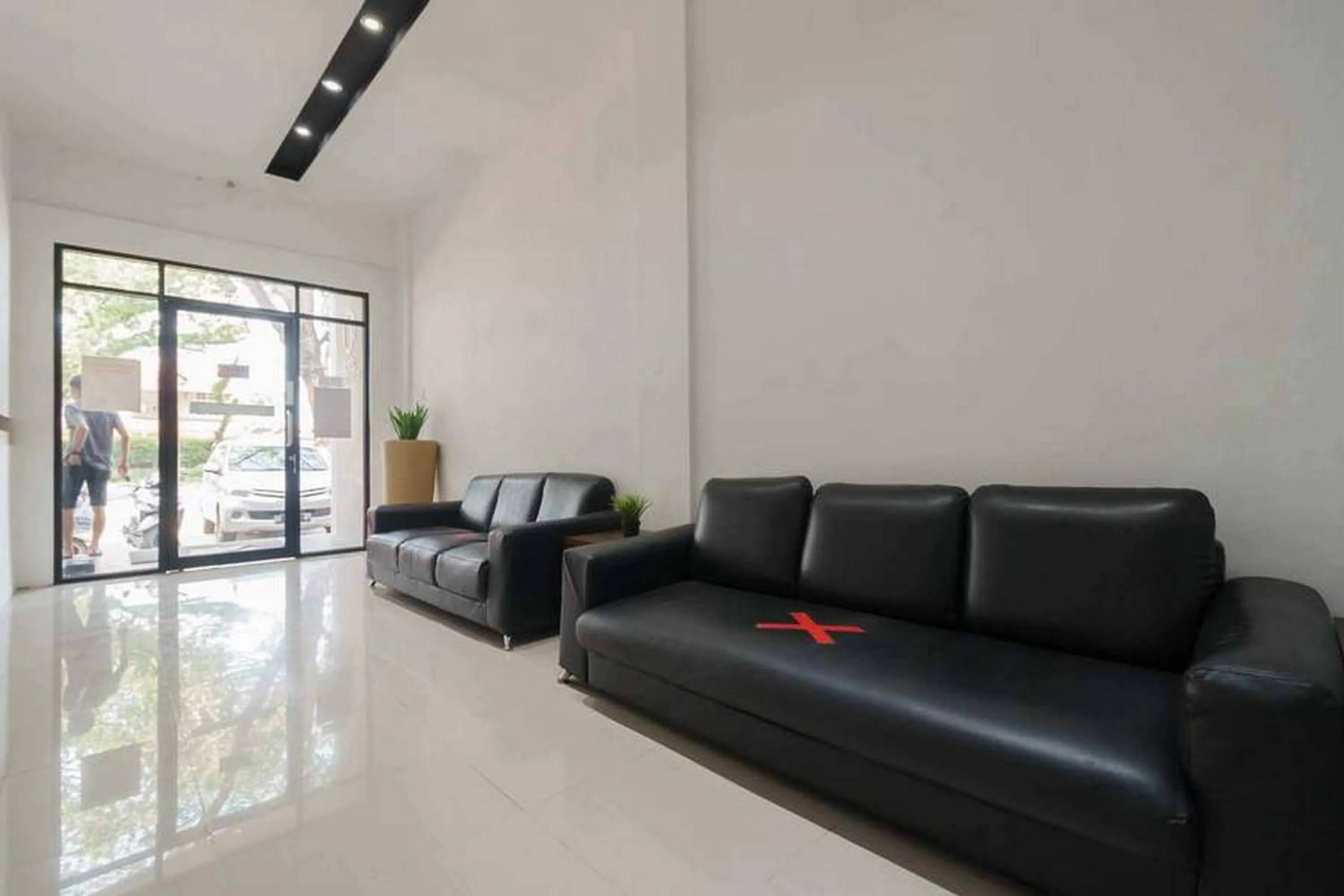 Facade/entrance in RedDoorz at Jotel Guest House Medan