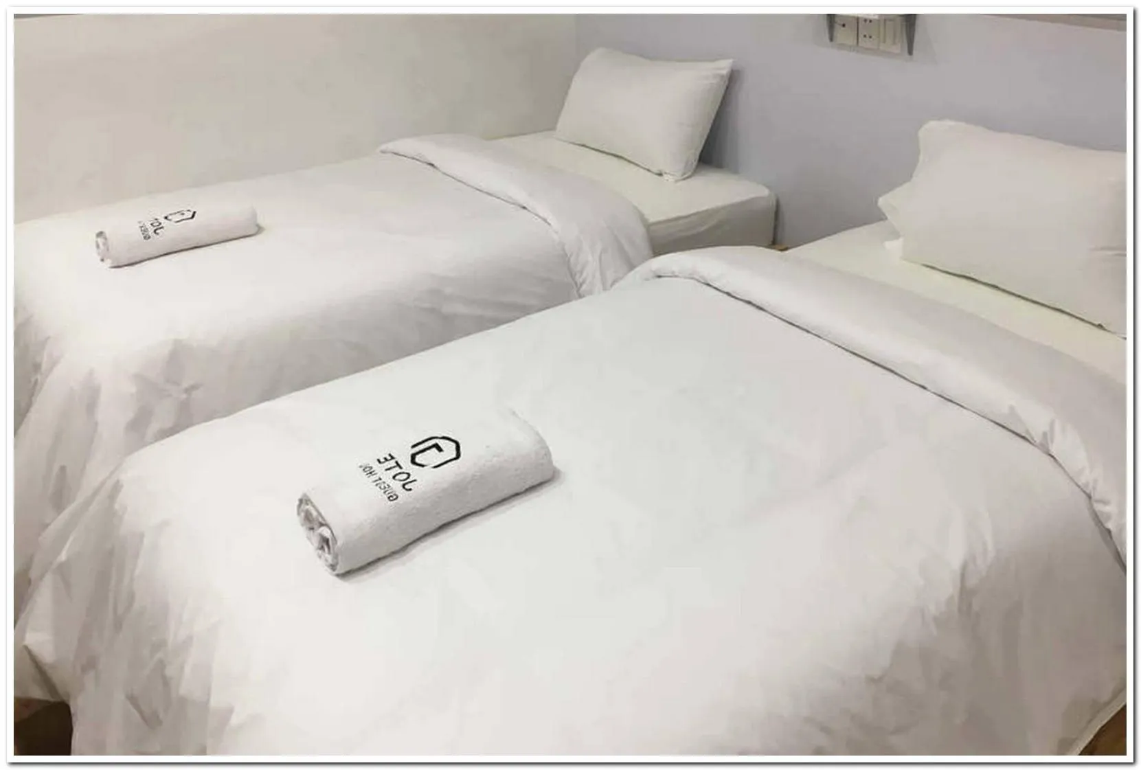 Bedroom, Bed in RedDoorz at Jotel Guest House Medan