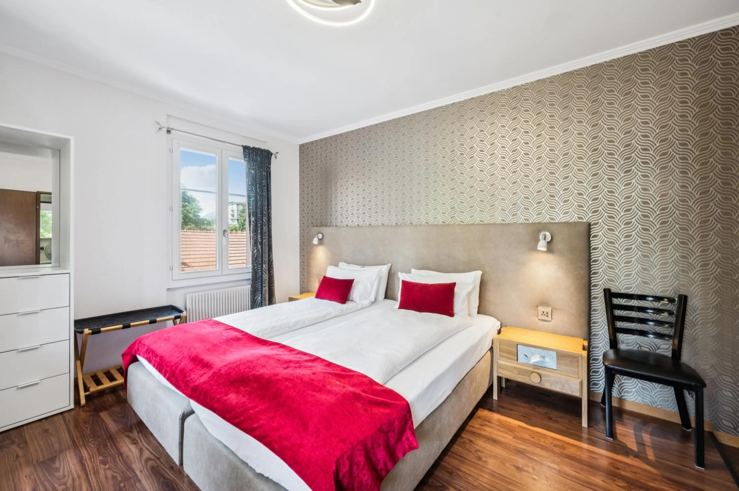 Bedroom, Bed in Hotel Sonne Interlaken-Matten