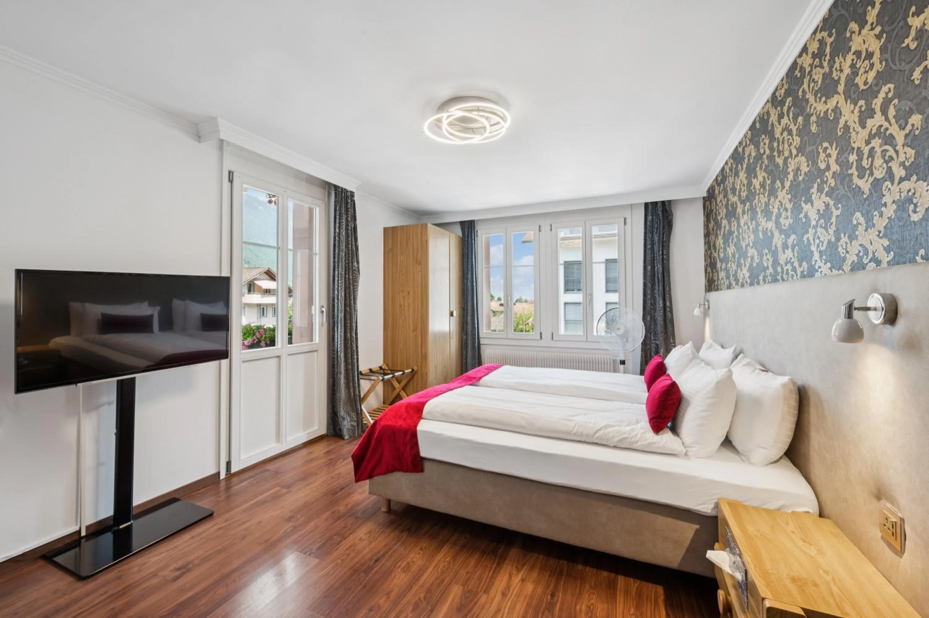 Bedroom, Bed in Hotel Sonne Interlaken-Matten