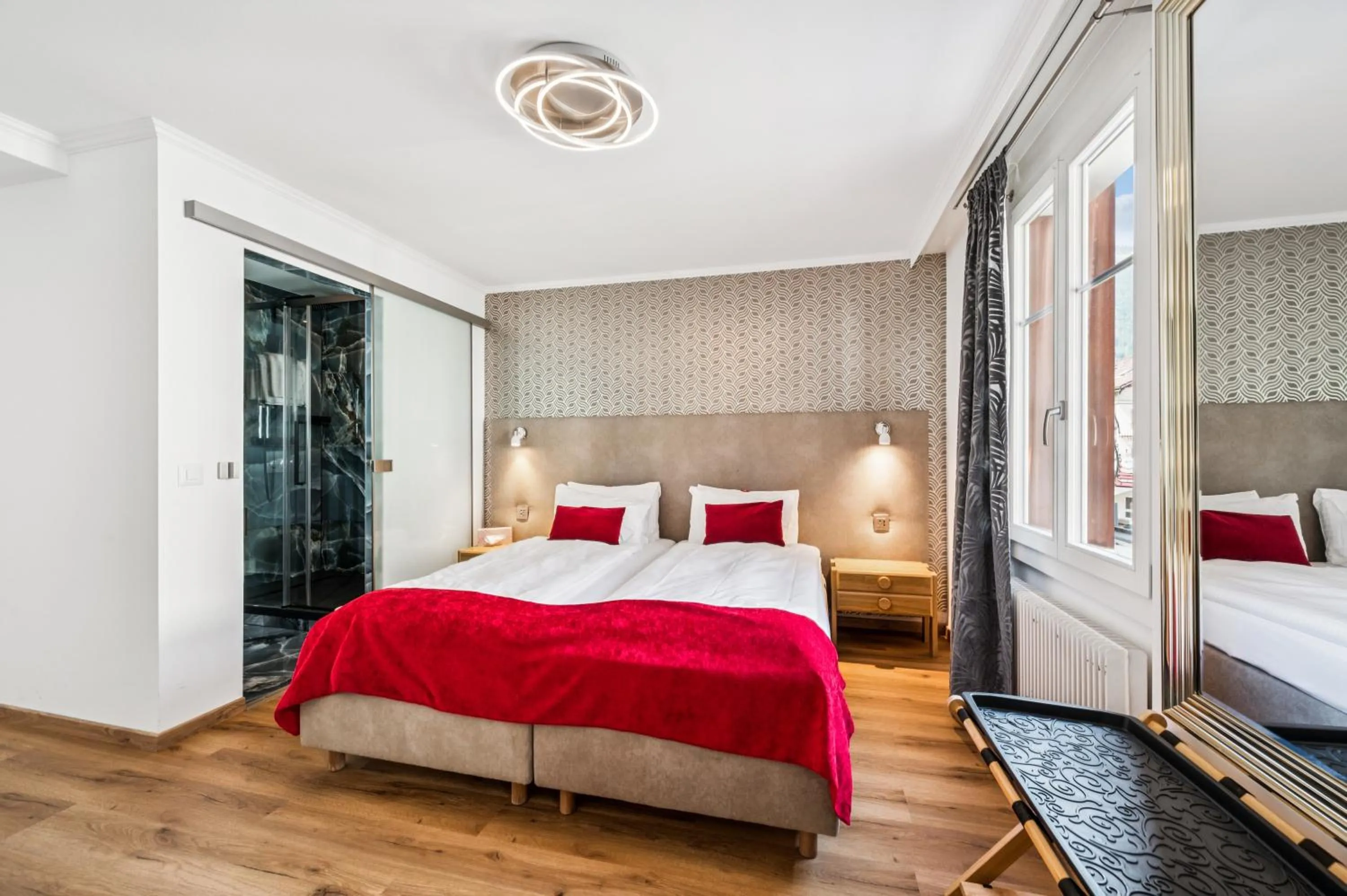 Bedroom, Bed in Hotel Sonne Interlaken-Matten