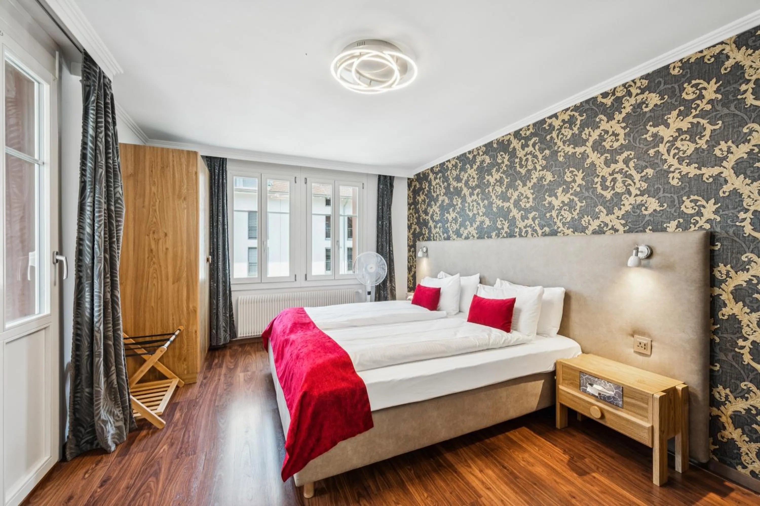 Bedroom, Bed in Hotel Sonne Interlaken-Matten