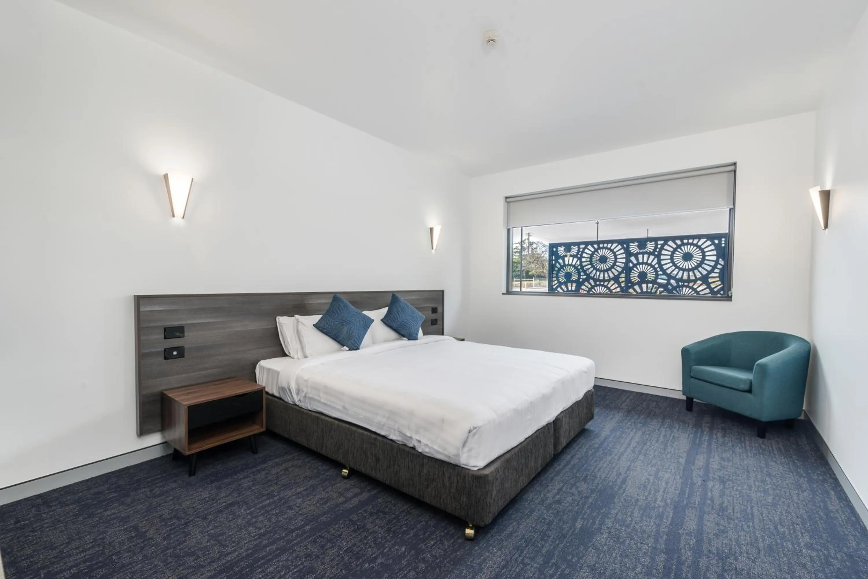 Bed in Thornton Executive Hotel