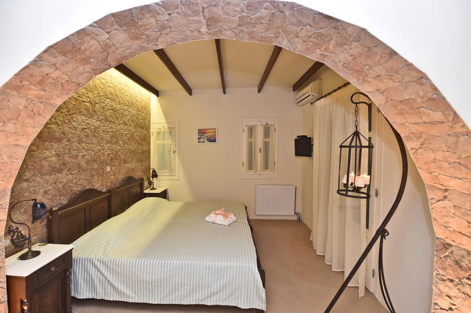 Bed in TINOS AQUA PALAZZO