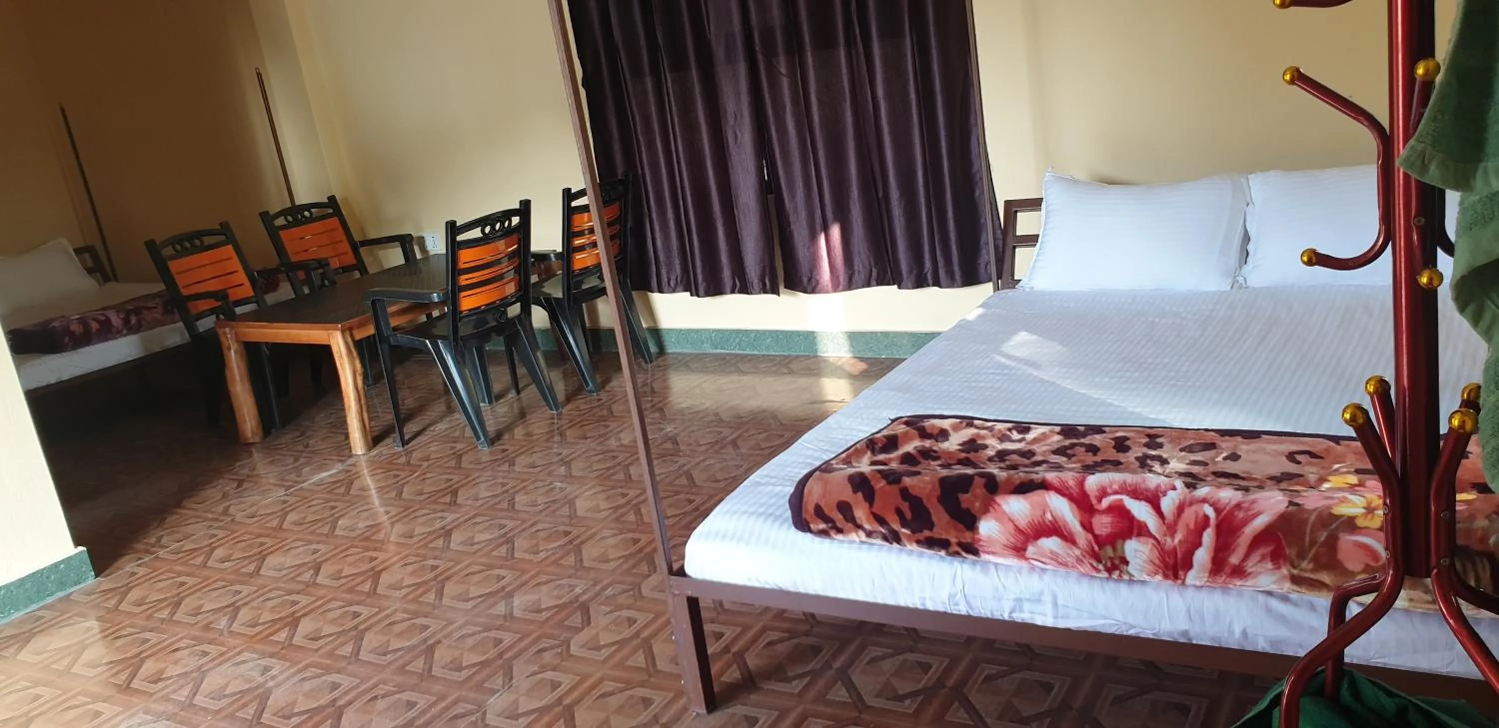 Bed in Elephant Garden Hotel and Resort Pvt Ltd