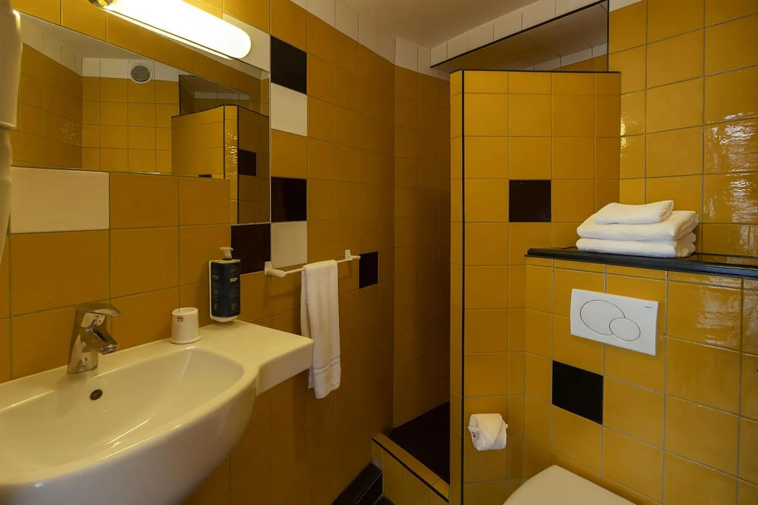 Shower in Walled off Hotel Paris