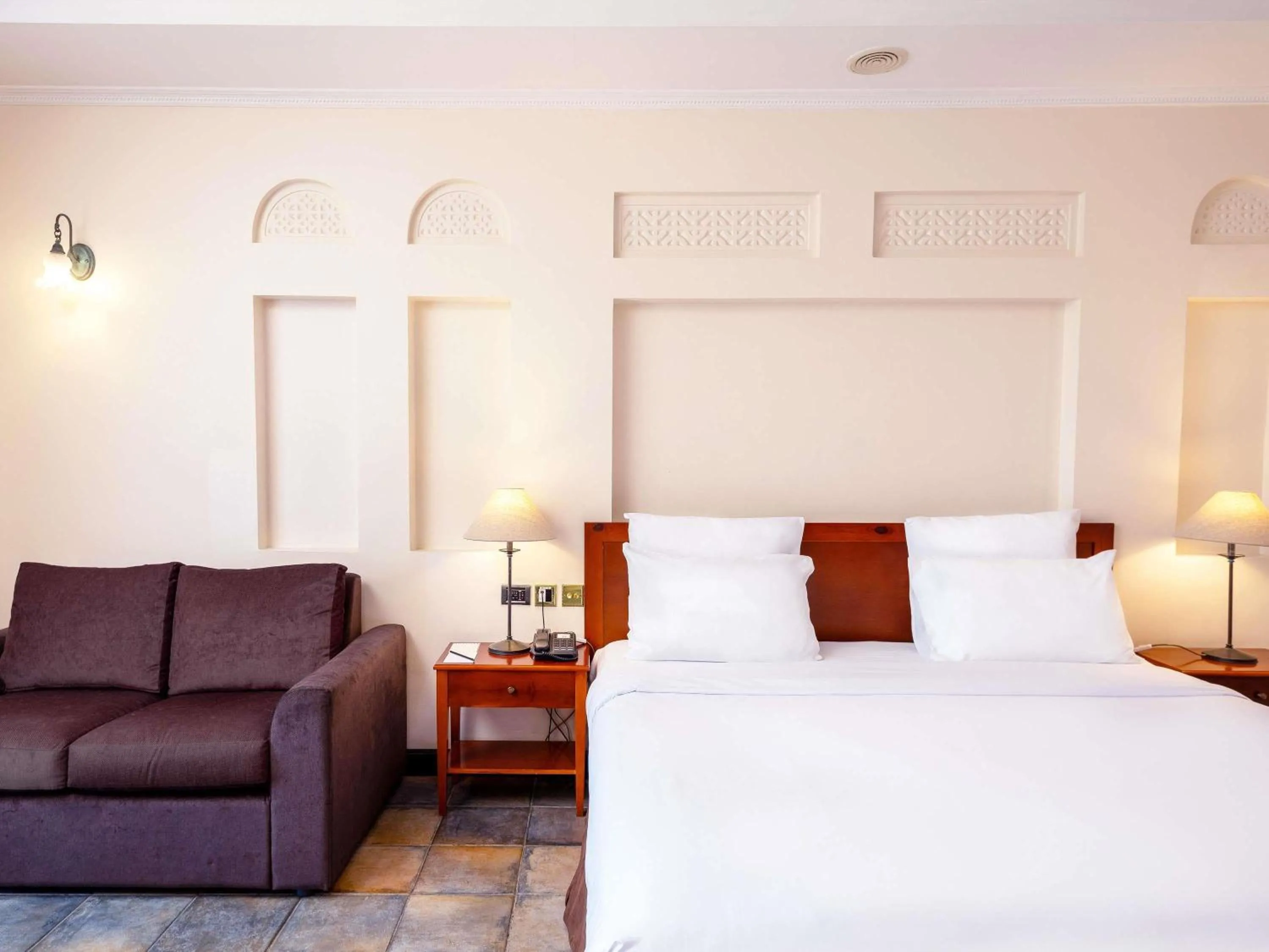 Superior King Room with Balcony and Beach View in Novotel Bahrain Al Dana Resort