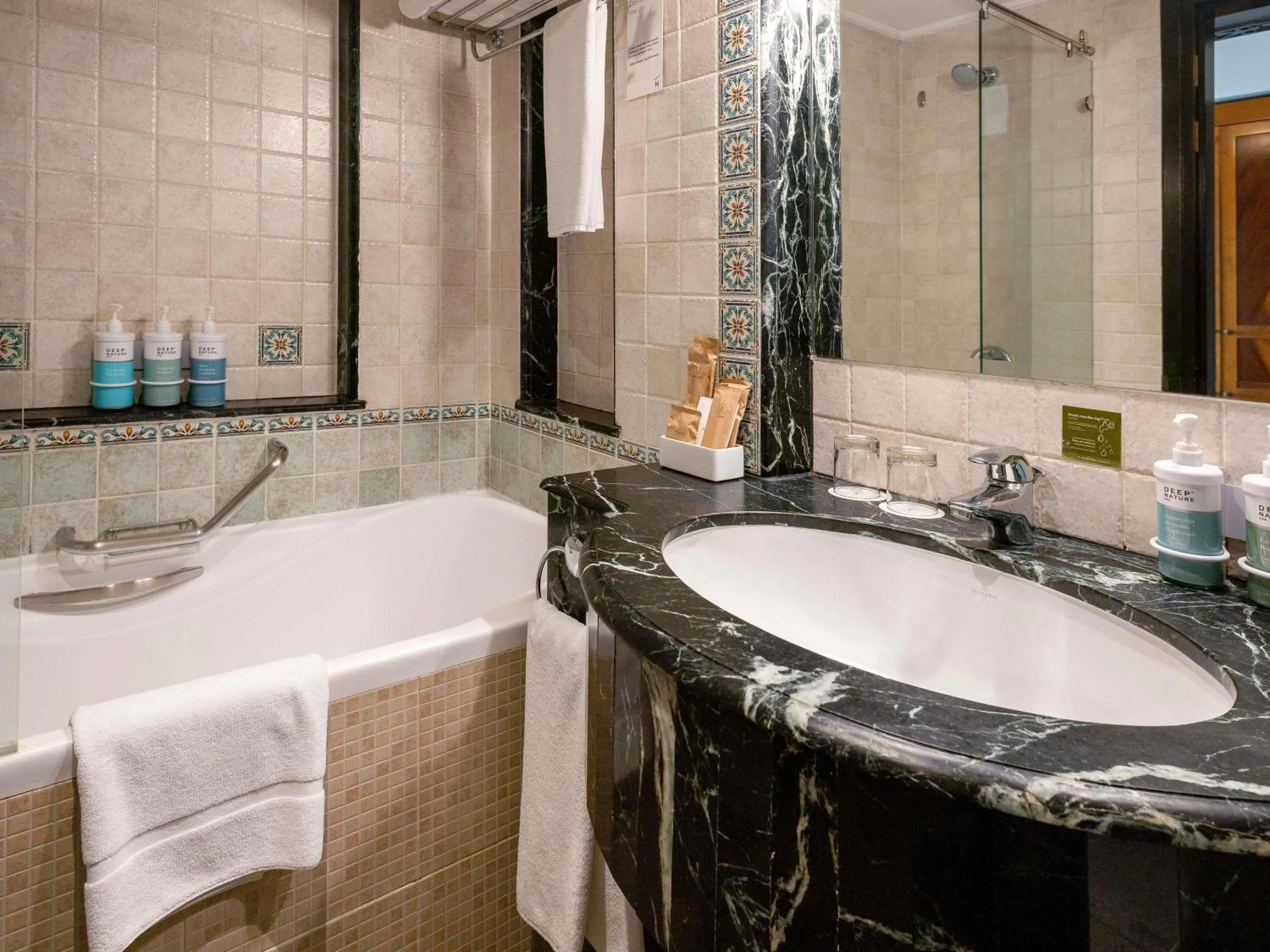 One Bedroom Suite with Balcony Beach View in Novotel Bahrain Al Dana Resort