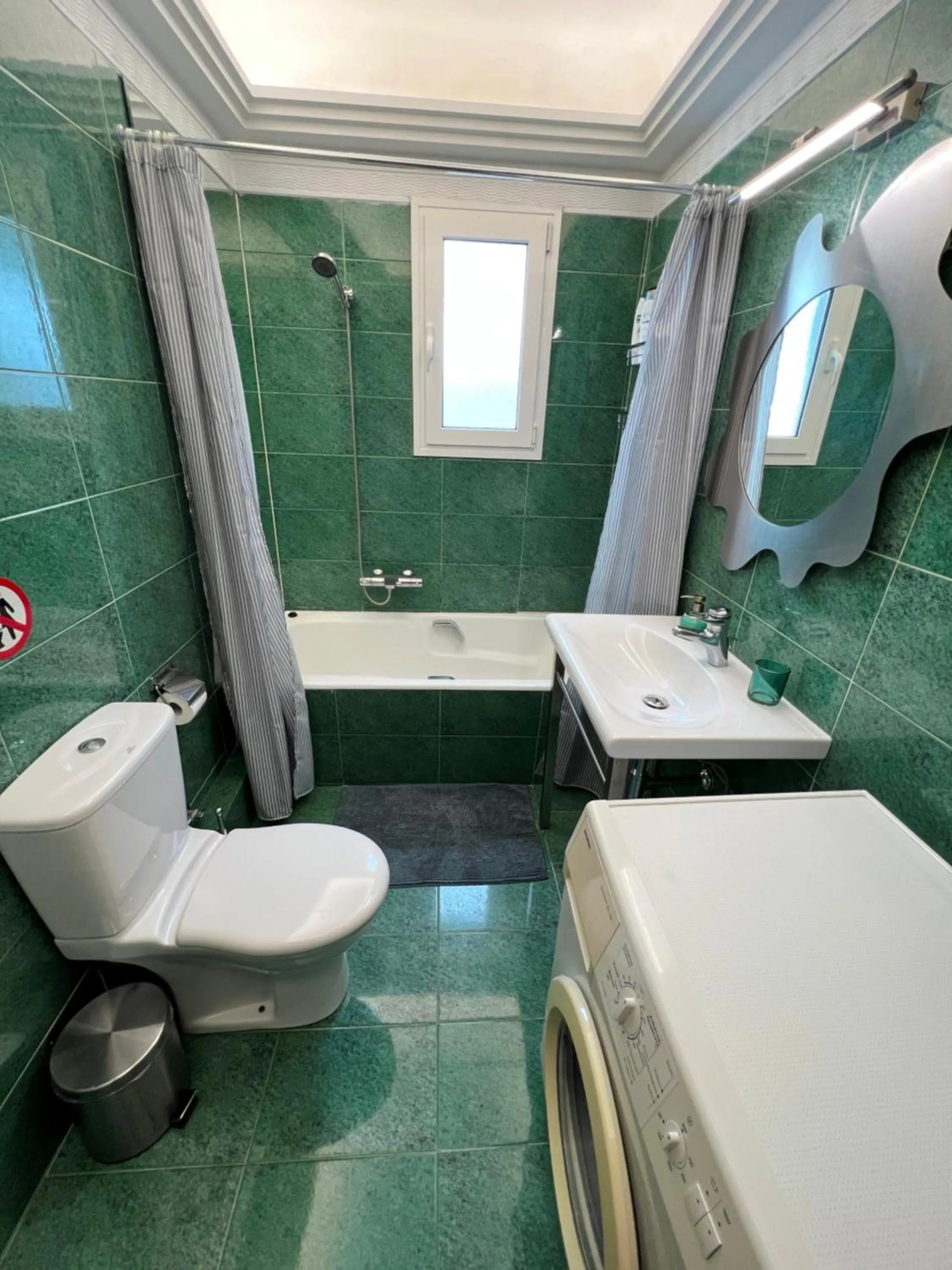 Bathroom in Peaceful Apartment by Flisvos Marina by Athenian Homes