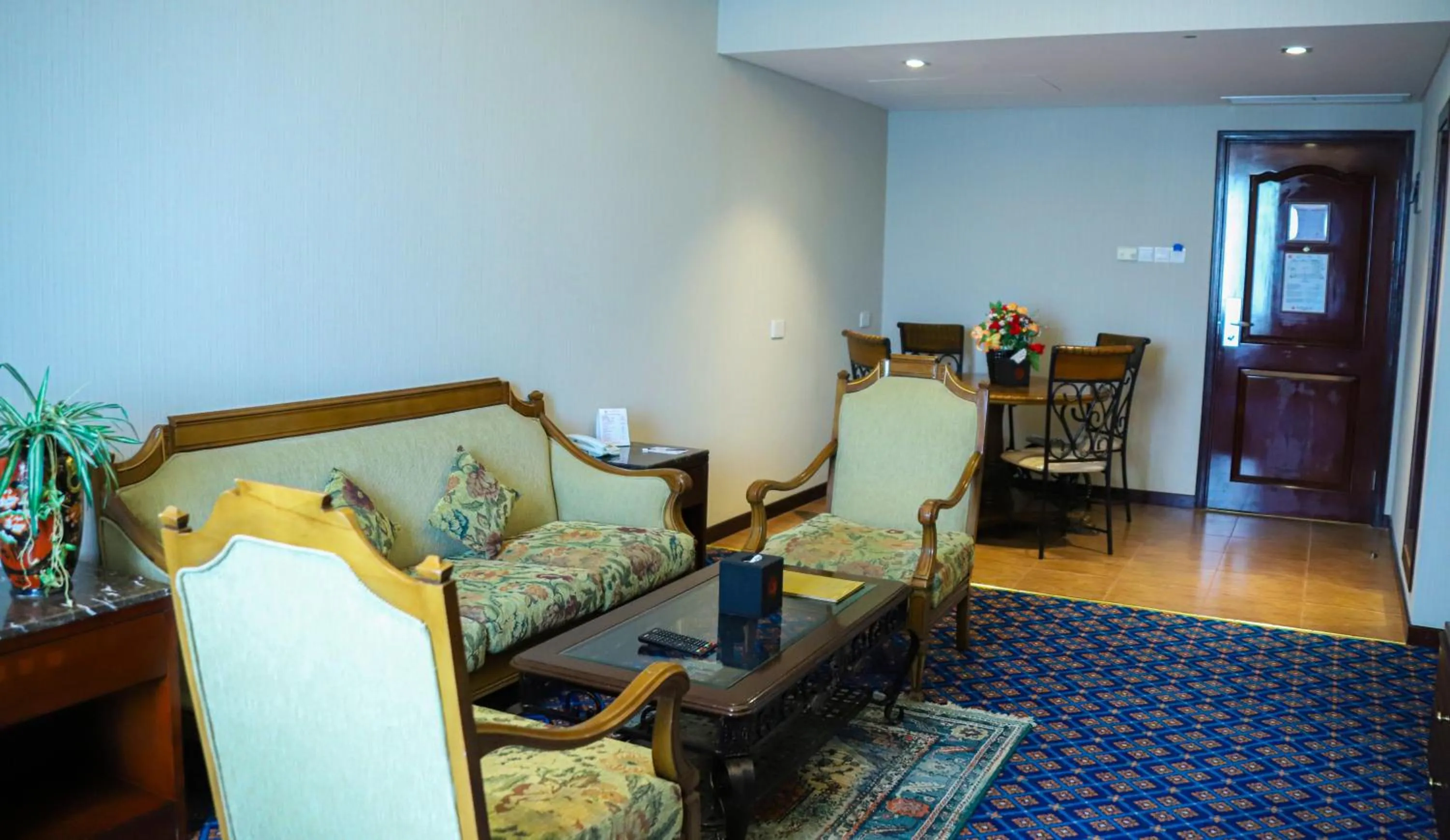 Seating area in Ramee Guestline Hotel