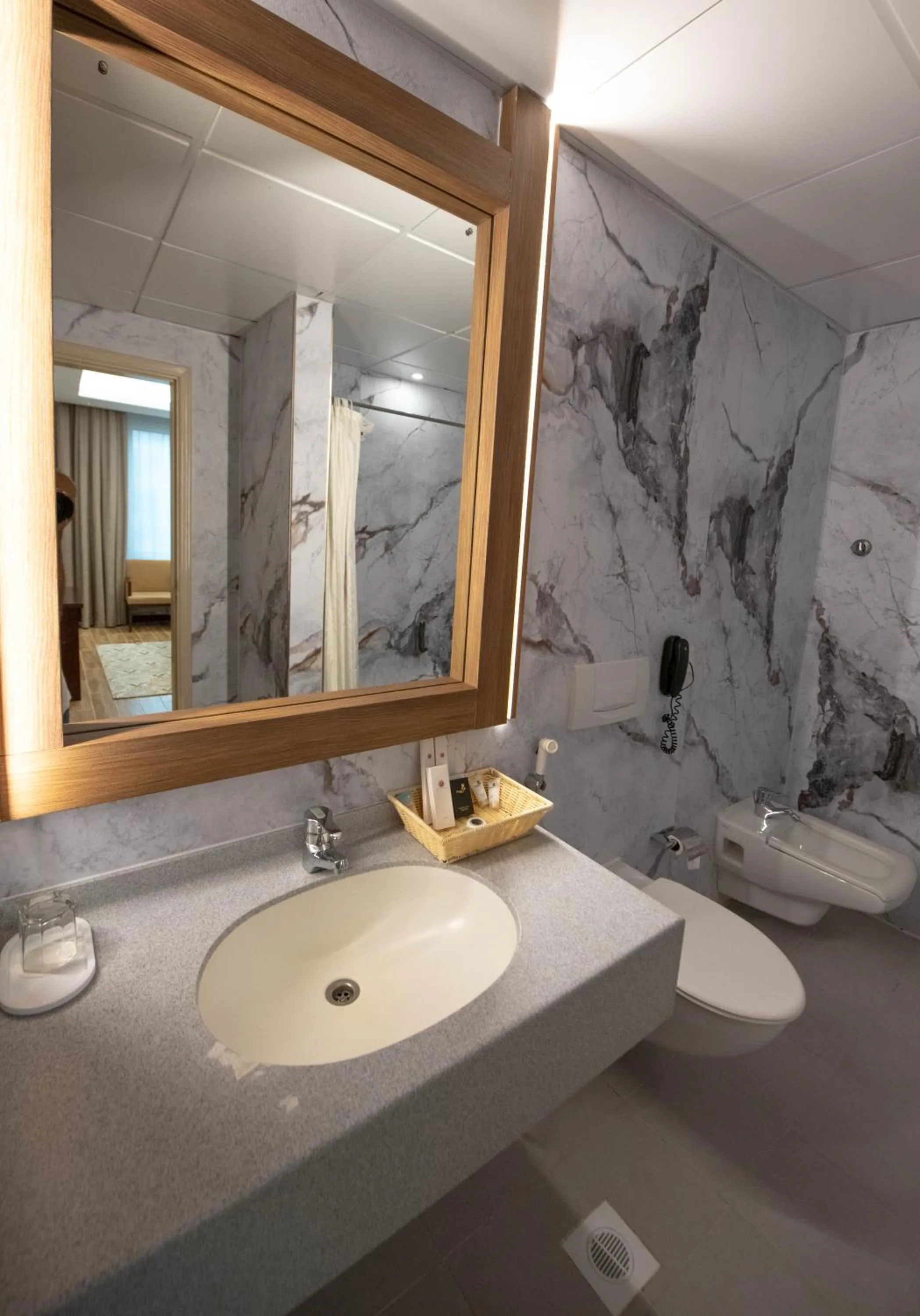 Bathroom in Ramee Guestline Hotel