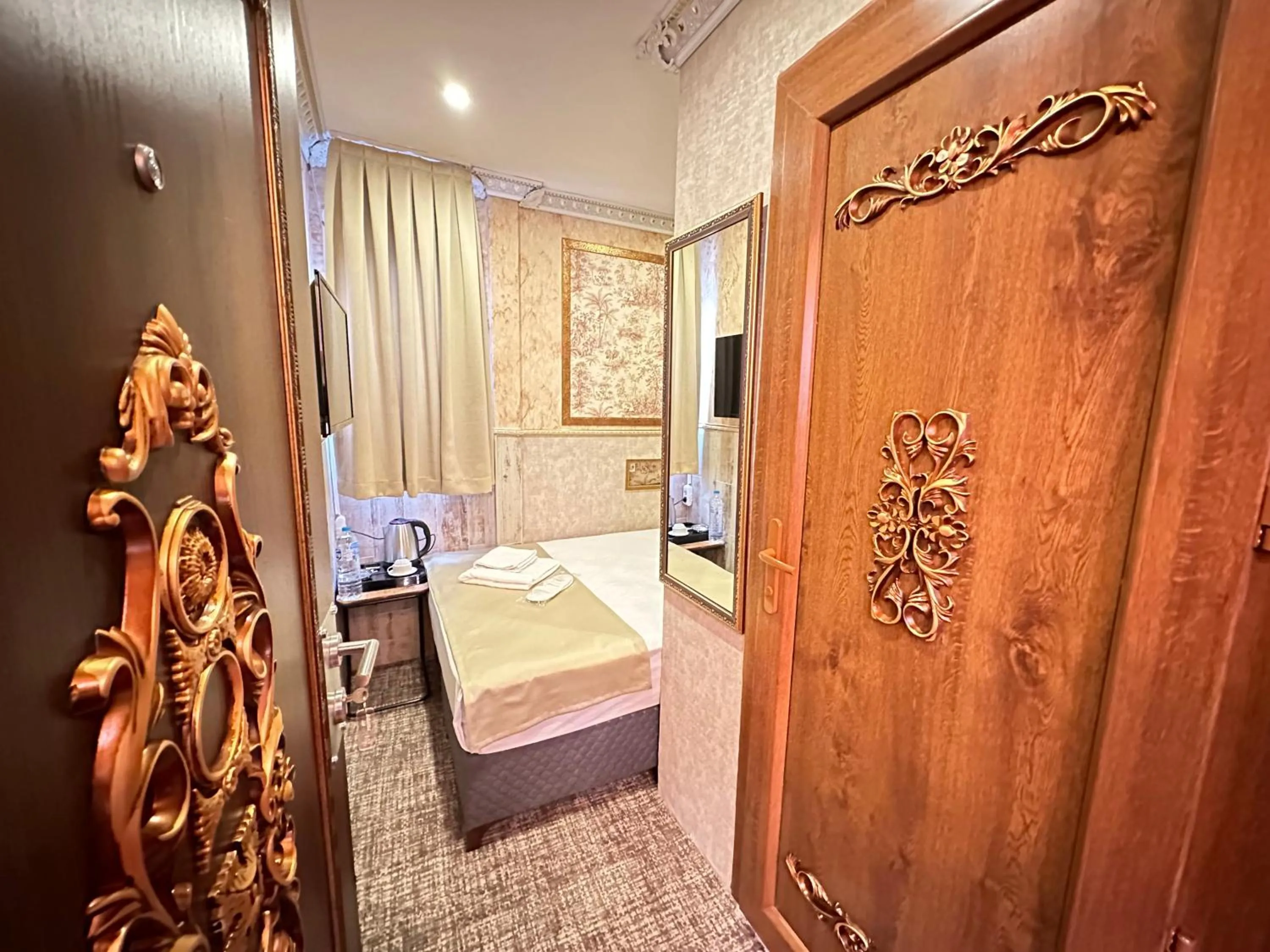 Bed in Maranda Suit Hotel