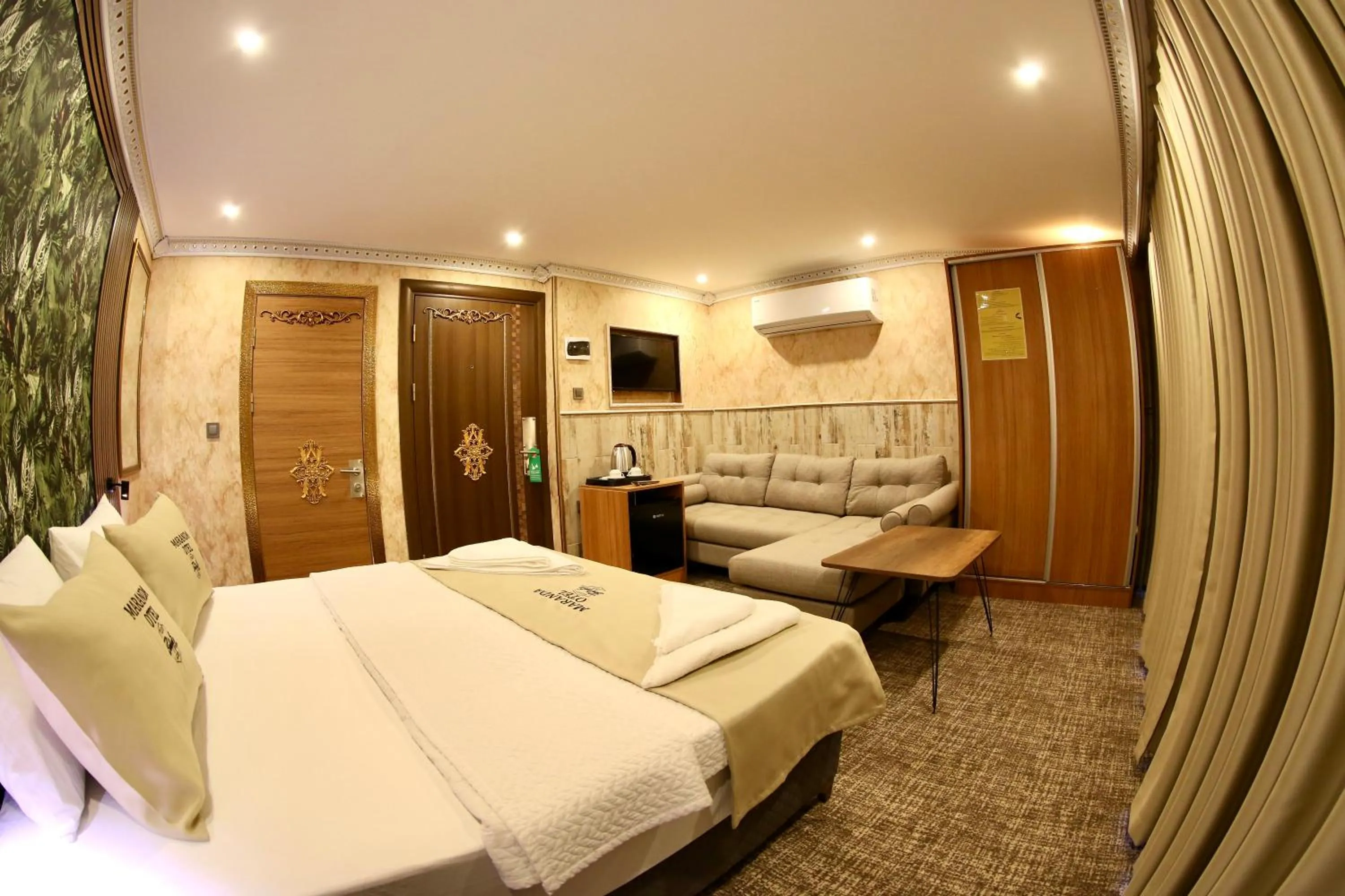 Bed in Maranda Suit Hotel