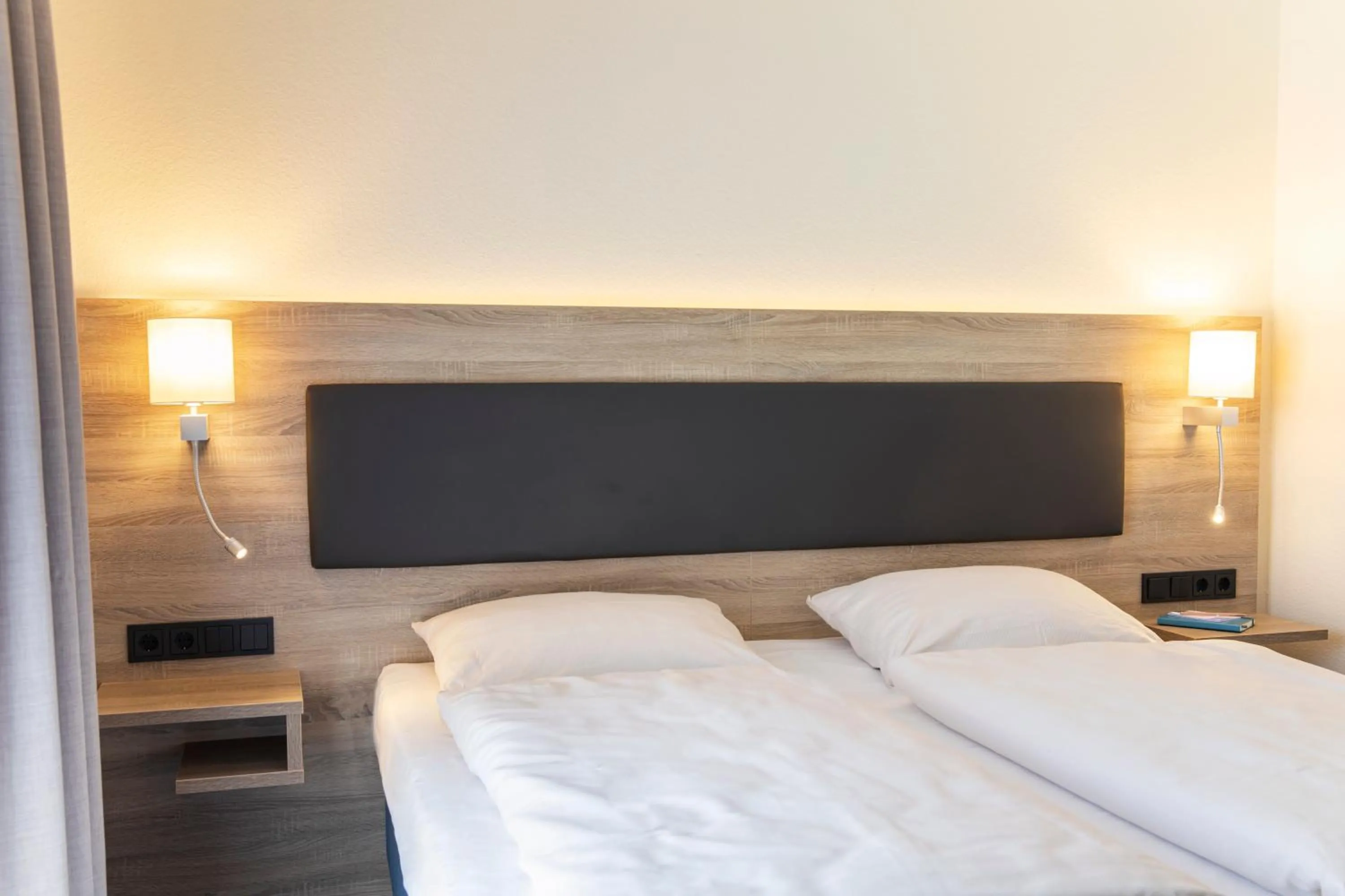 Bedroom, Bed in Hotel Lohr am Main by Michel Hotels
