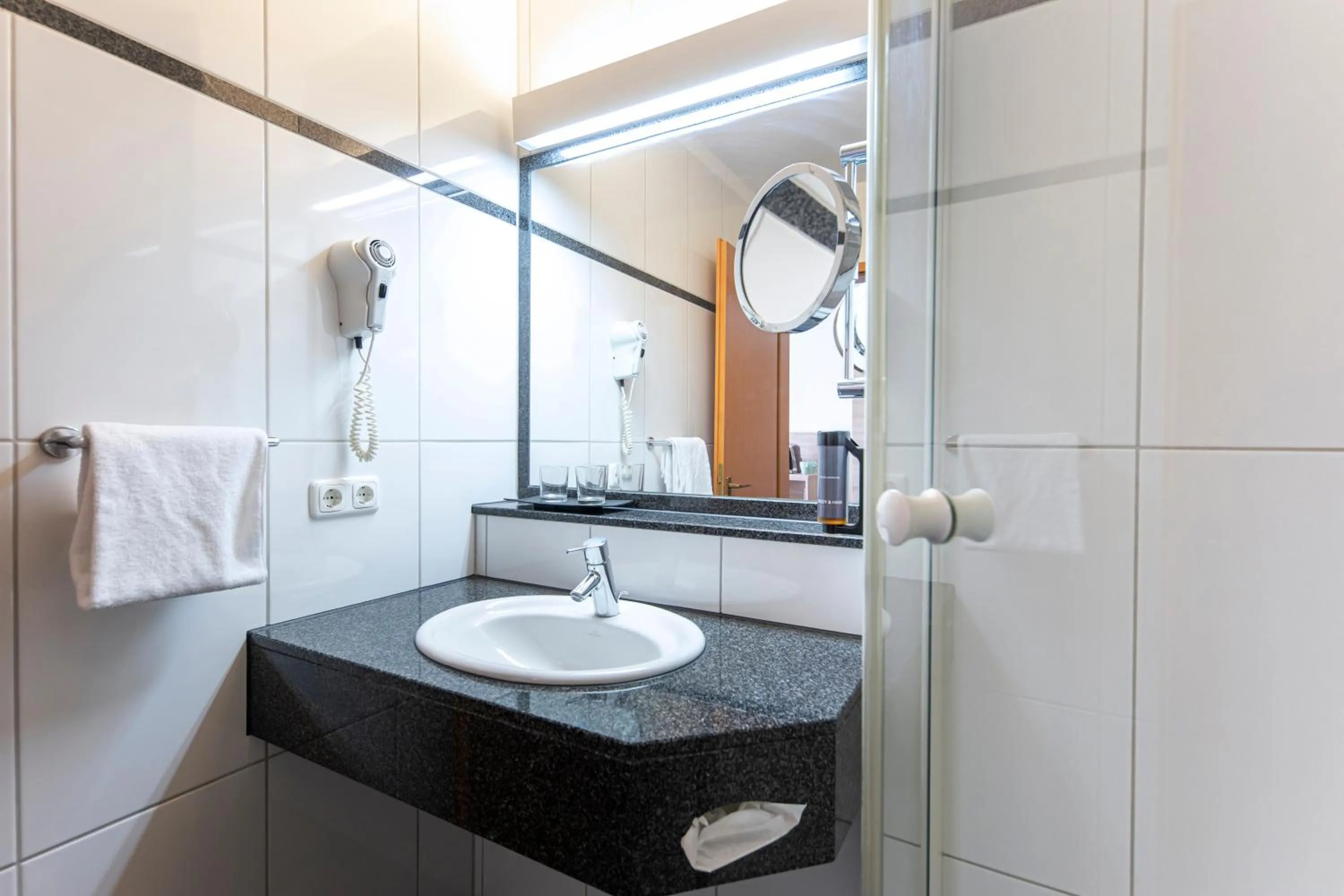 Bathroom in Hotel Lohr am Main by Michel Hotels