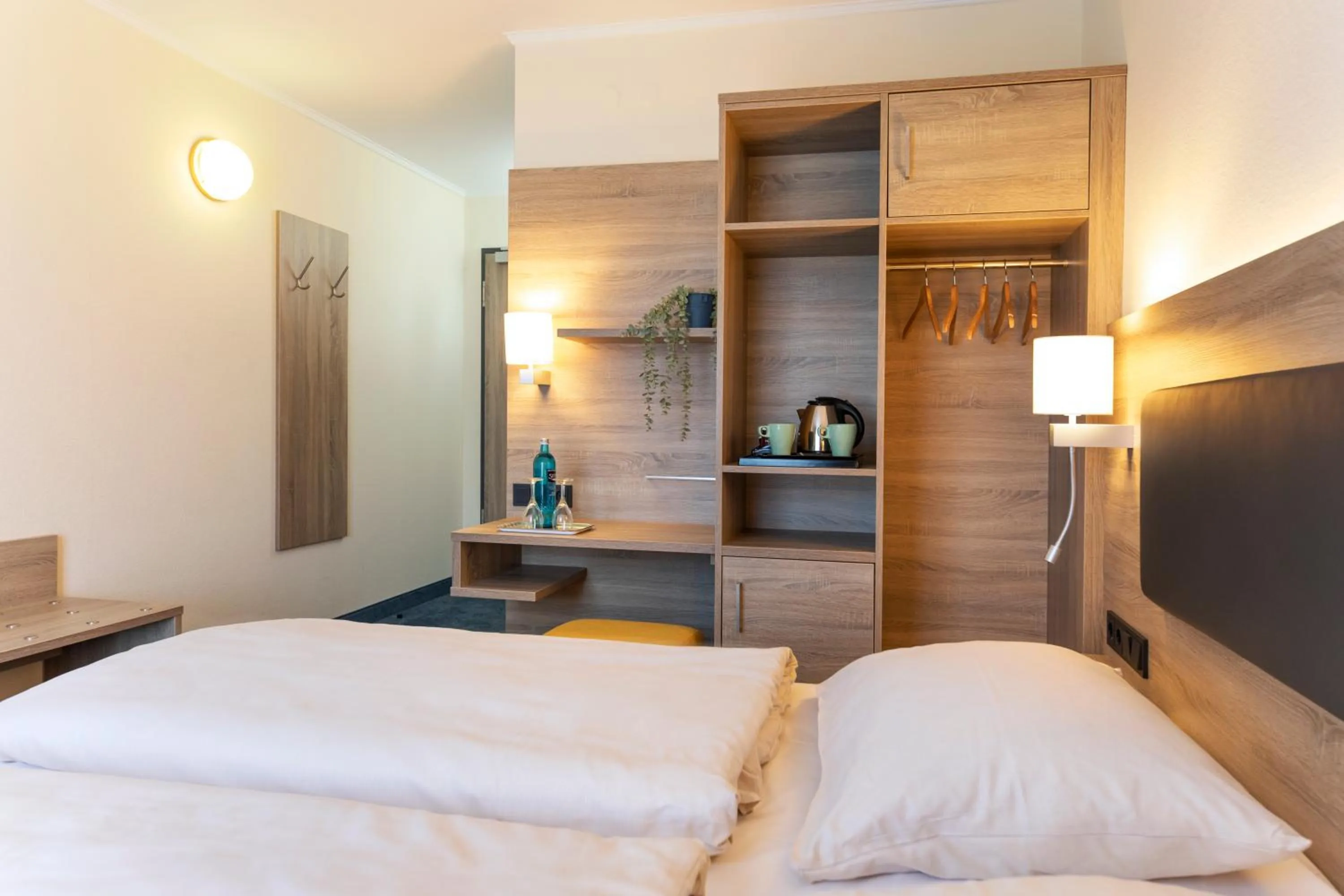 Photo of the whole room, Bed in Hotel Lohr am Main by Michel Hotels