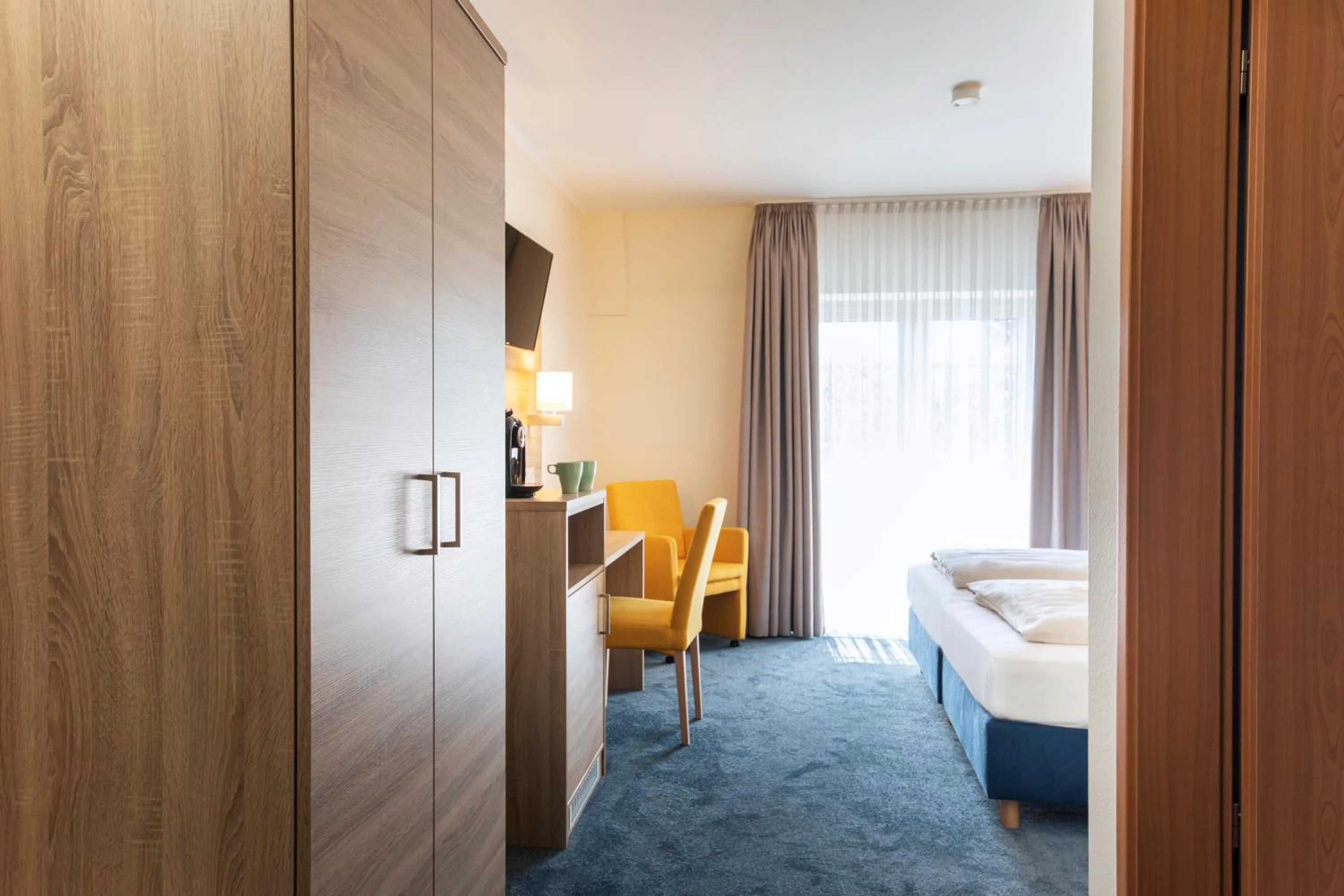 Bedroom, Bed in Hotel Lohr am Main by Michel Hotels