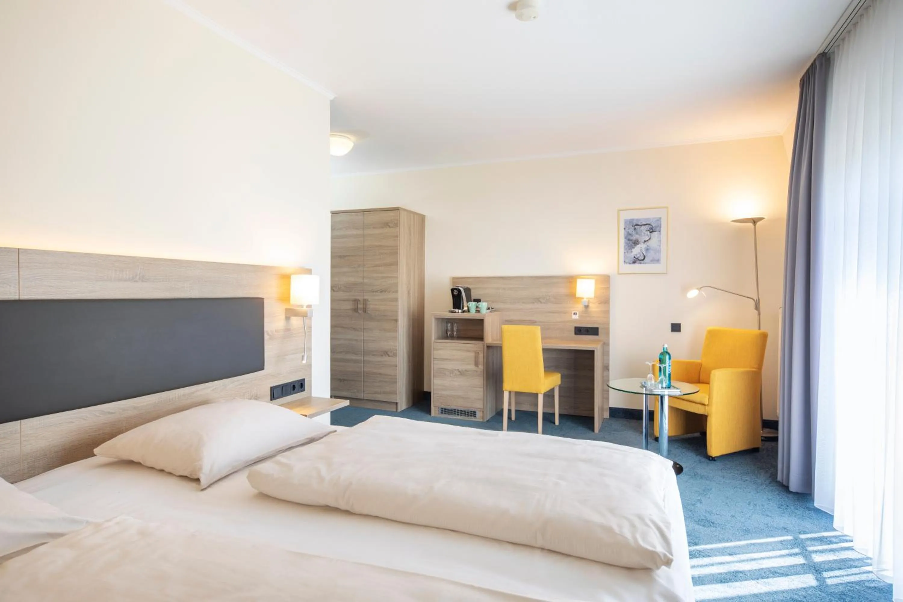 Photo of the whole room, Bed in Hotel Lohr am Main by Michel Hotels