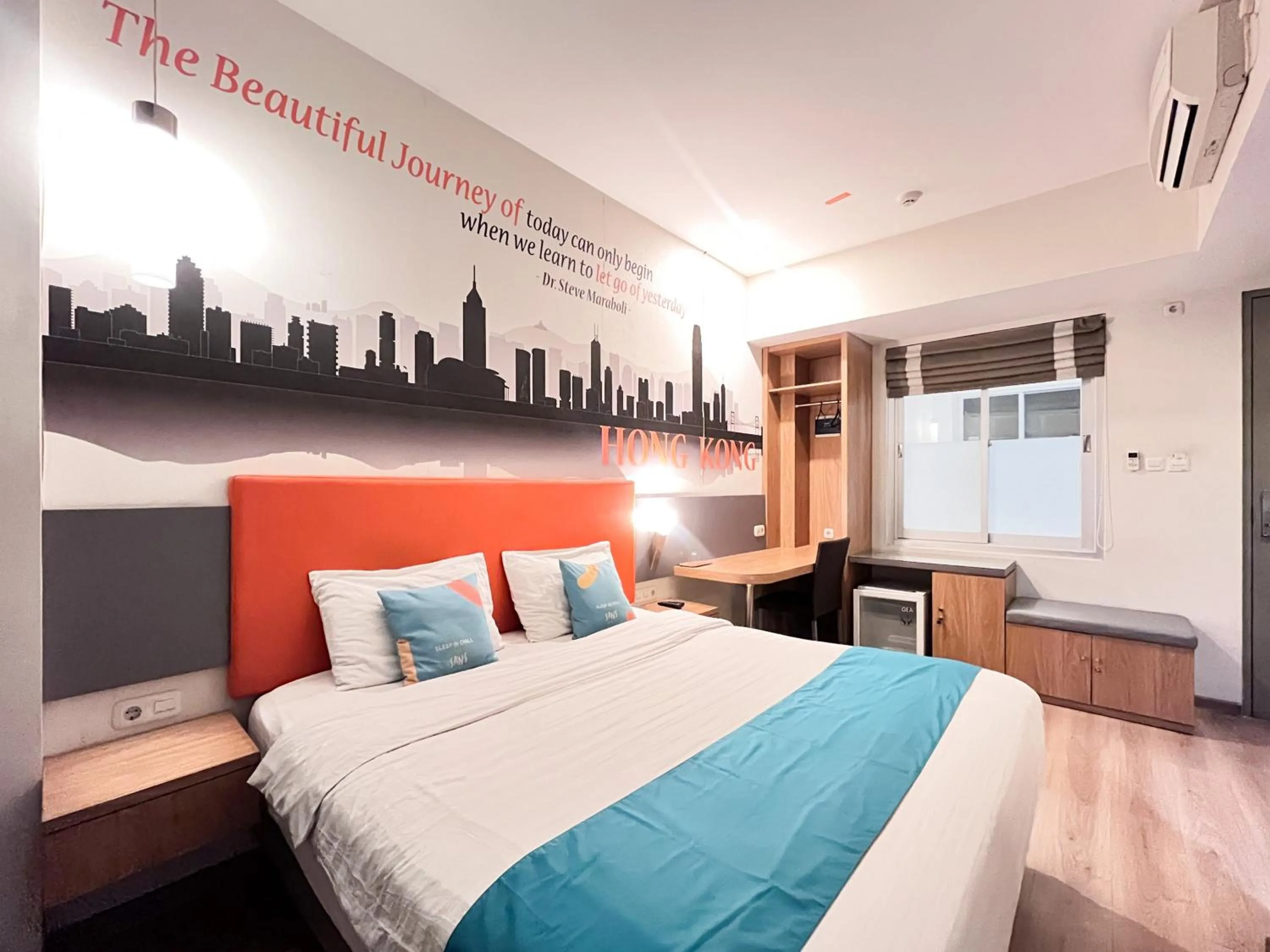 Bedroom, Bed in Sans Vibes Hotel Syariah Graha 100 Gubeng Surabaya